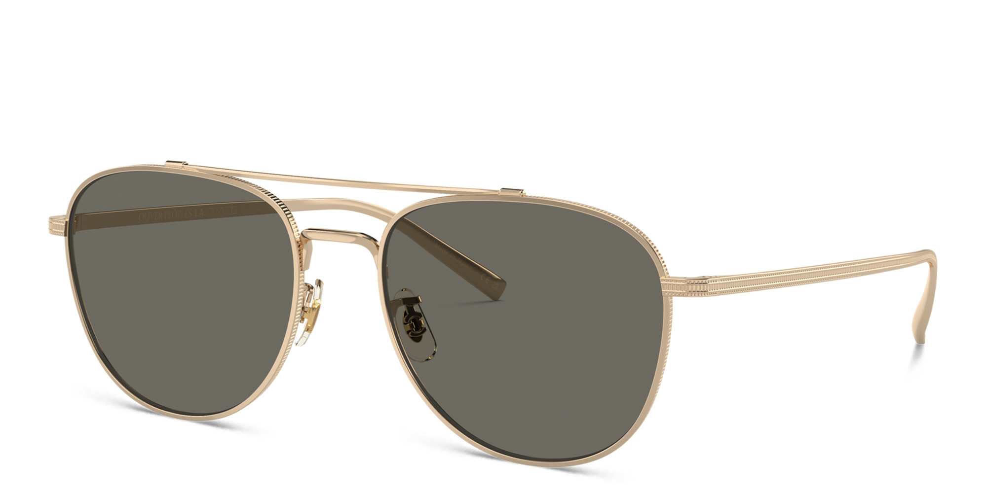 Shop OLIVER PEOPLES Rivetti Unisex pilot Sunglasses in Gold online.