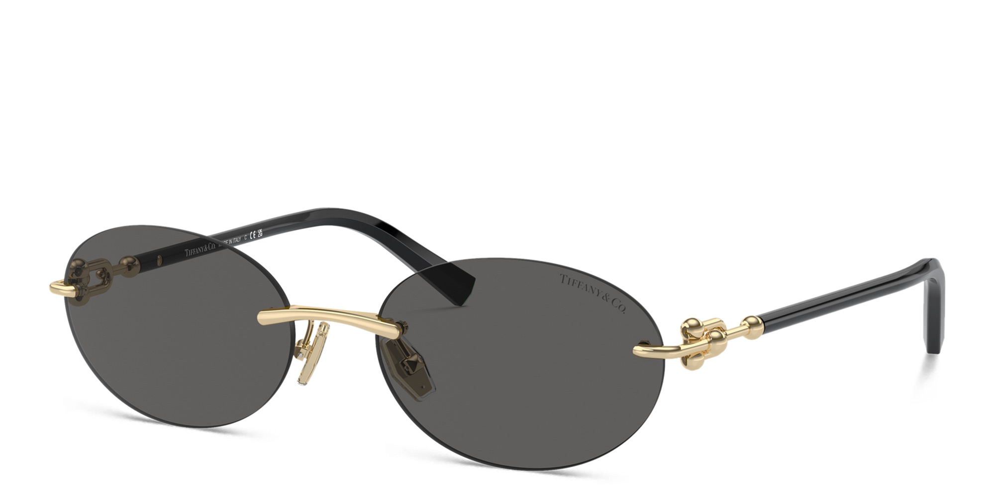 Shop TIFFANY Tiffany HardWear Rimless Oval Sunglasses in Gold online.