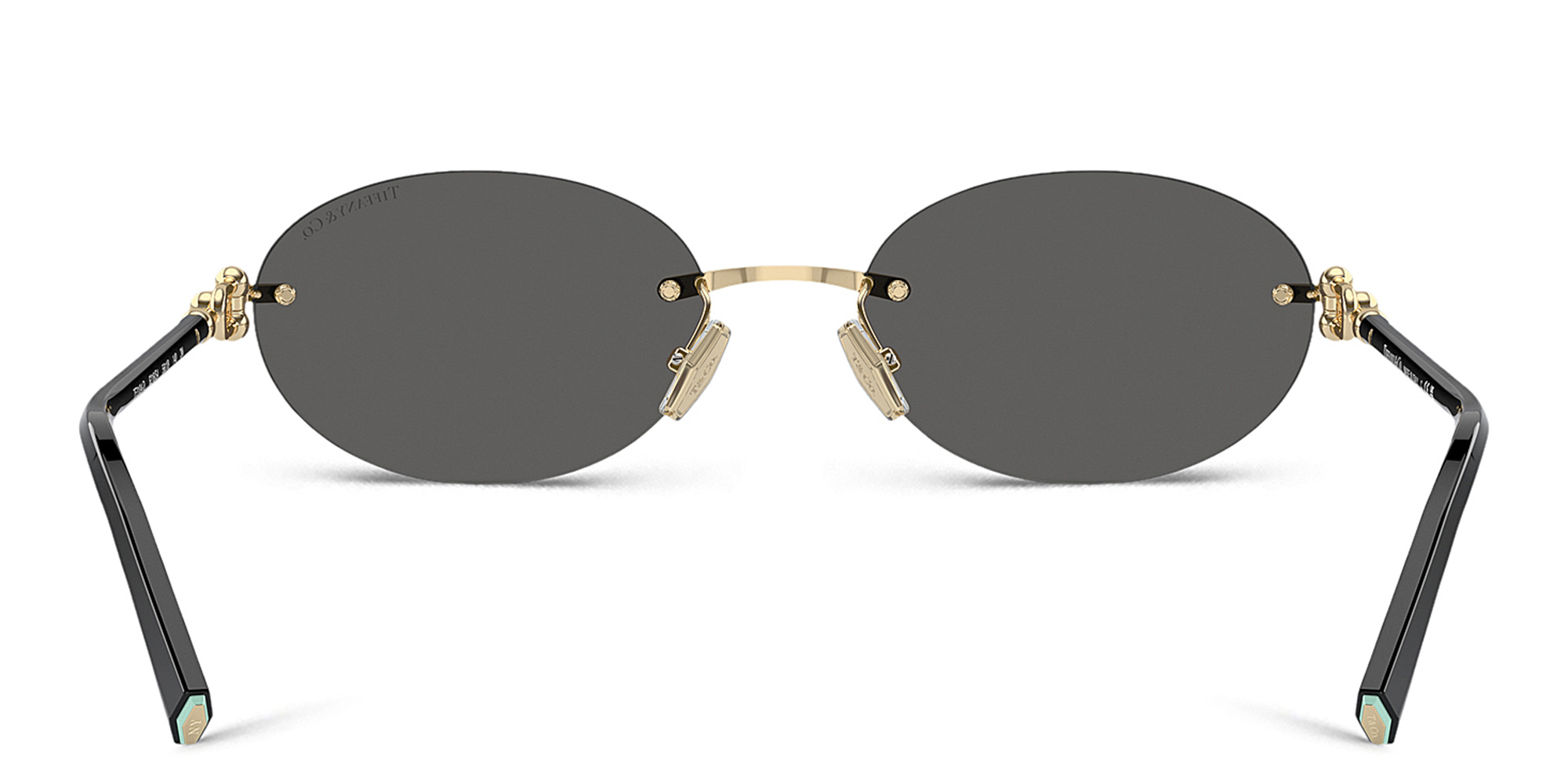 Shop TIFFANY Tiffany HardWear Rimless Oval Sunglasses in Gold online.