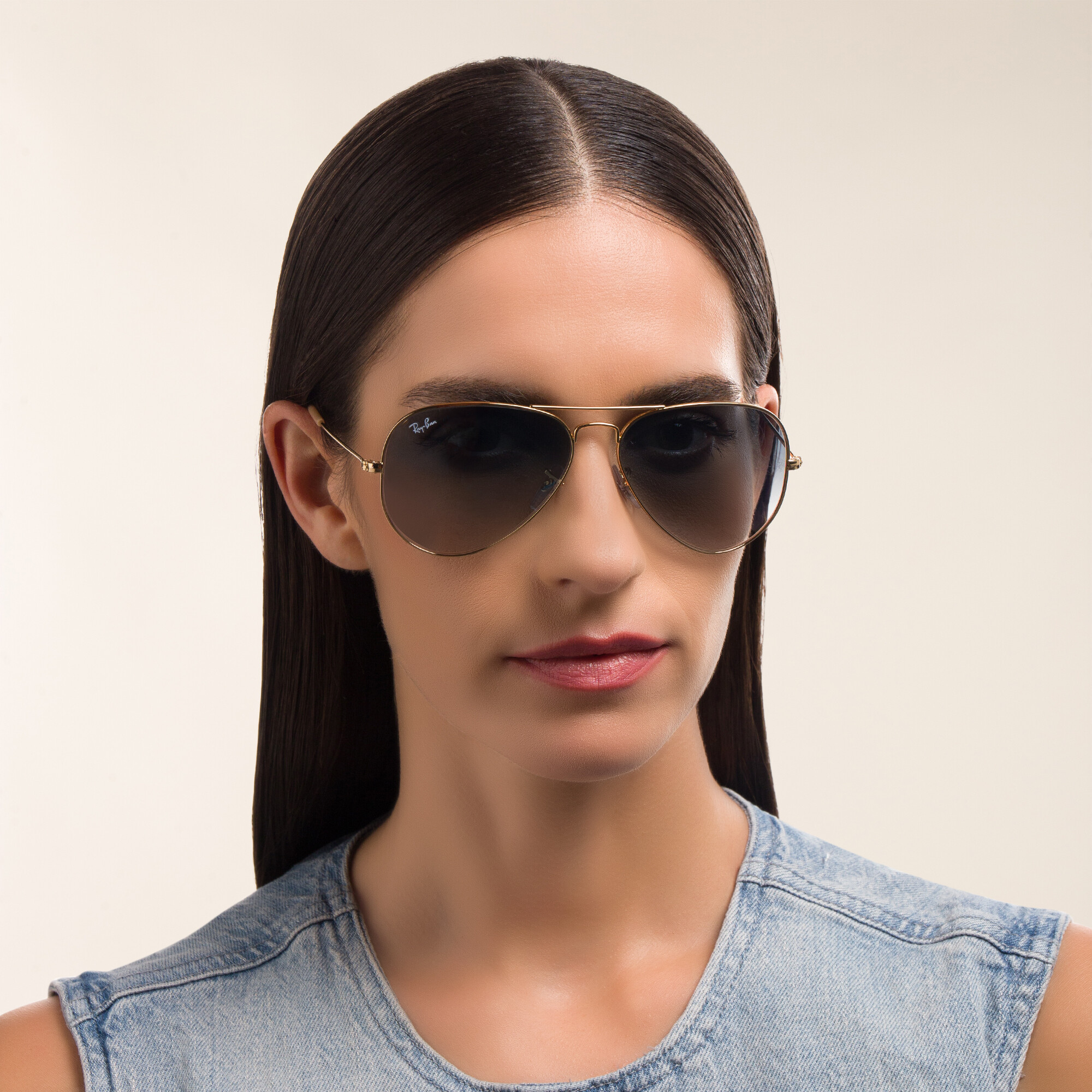 Shop Ray-Ban Unisex Pilot Sunglasses in Metal in Gold online.
