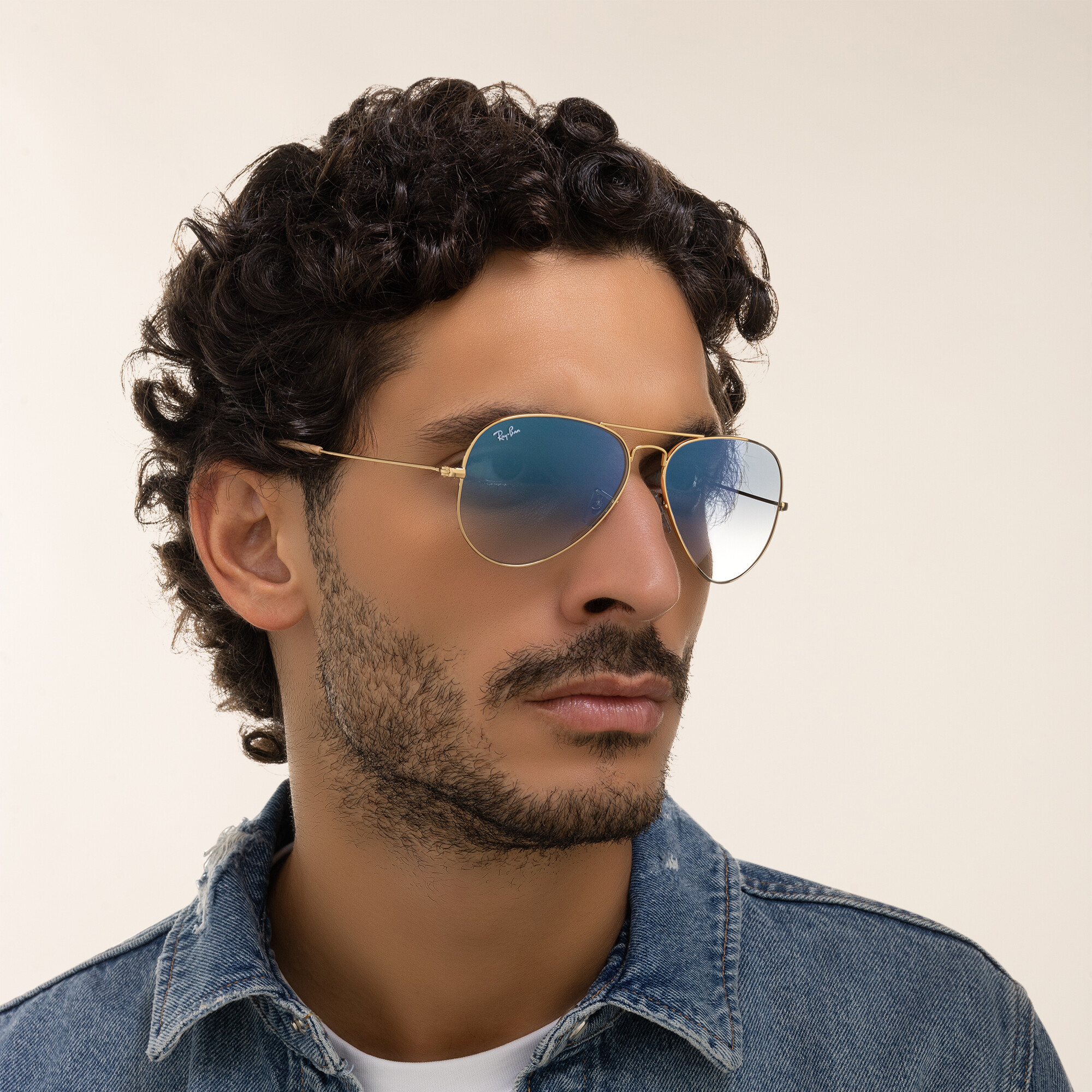 Shop Ray-Ban Unisex Pilot Sunglasses in Metal in Gold online.