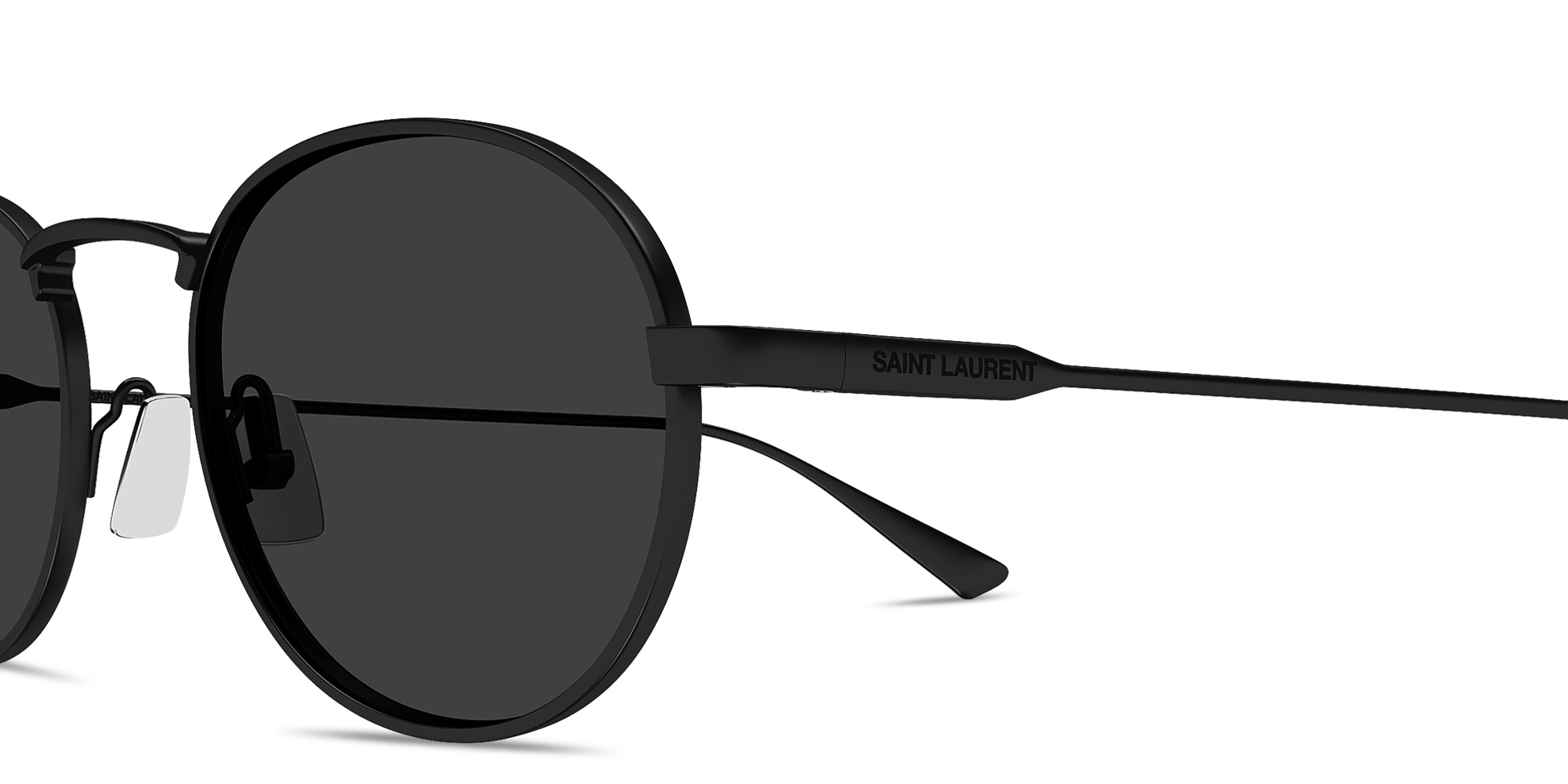 Shop SAINT LAURENT Engraved Logo Round Sunglasses in Black online.