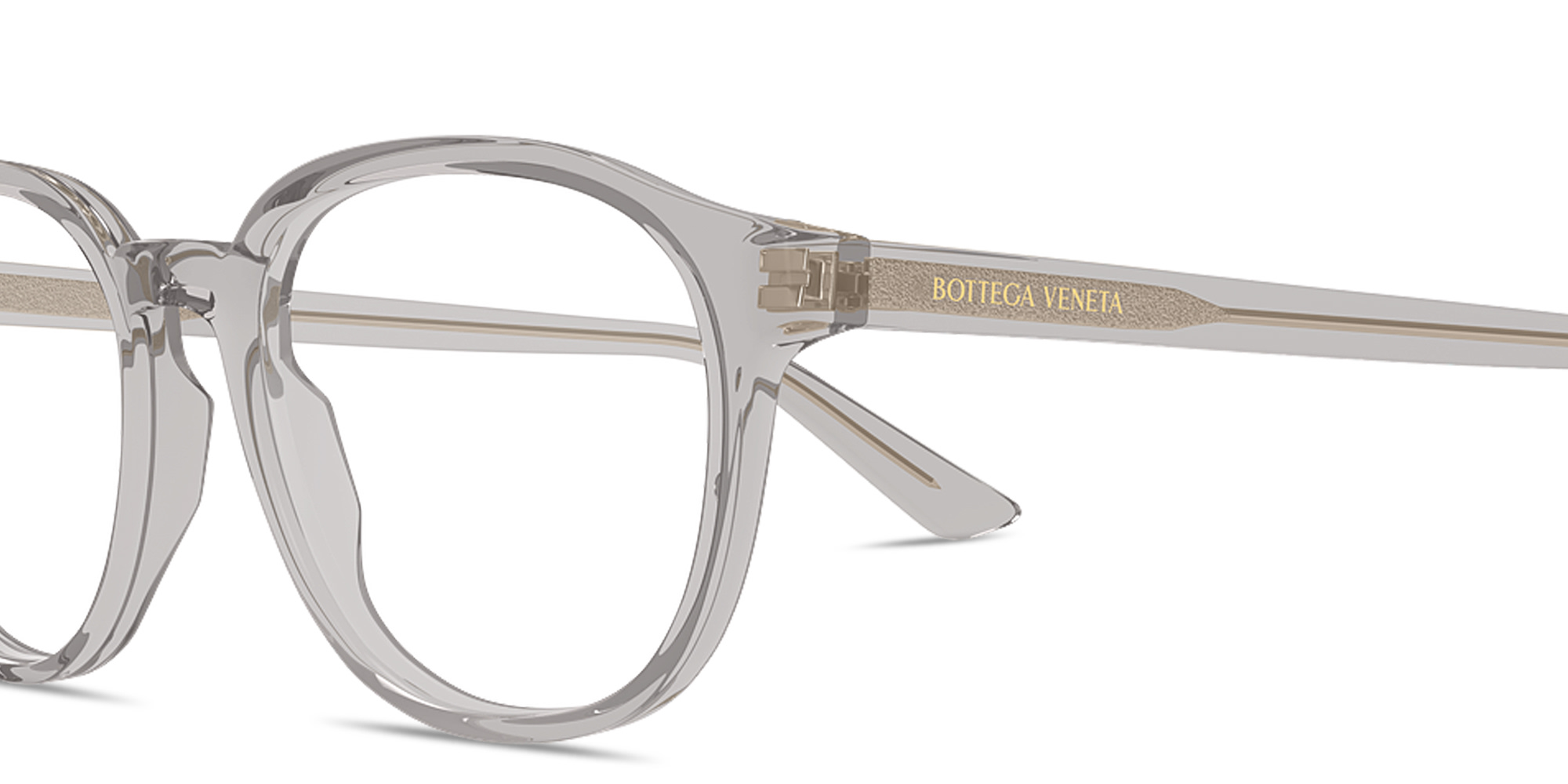 Shop BOTTEGA VENETA Logo Lettering Panthos Eyeglasses in Transparent Grey online.