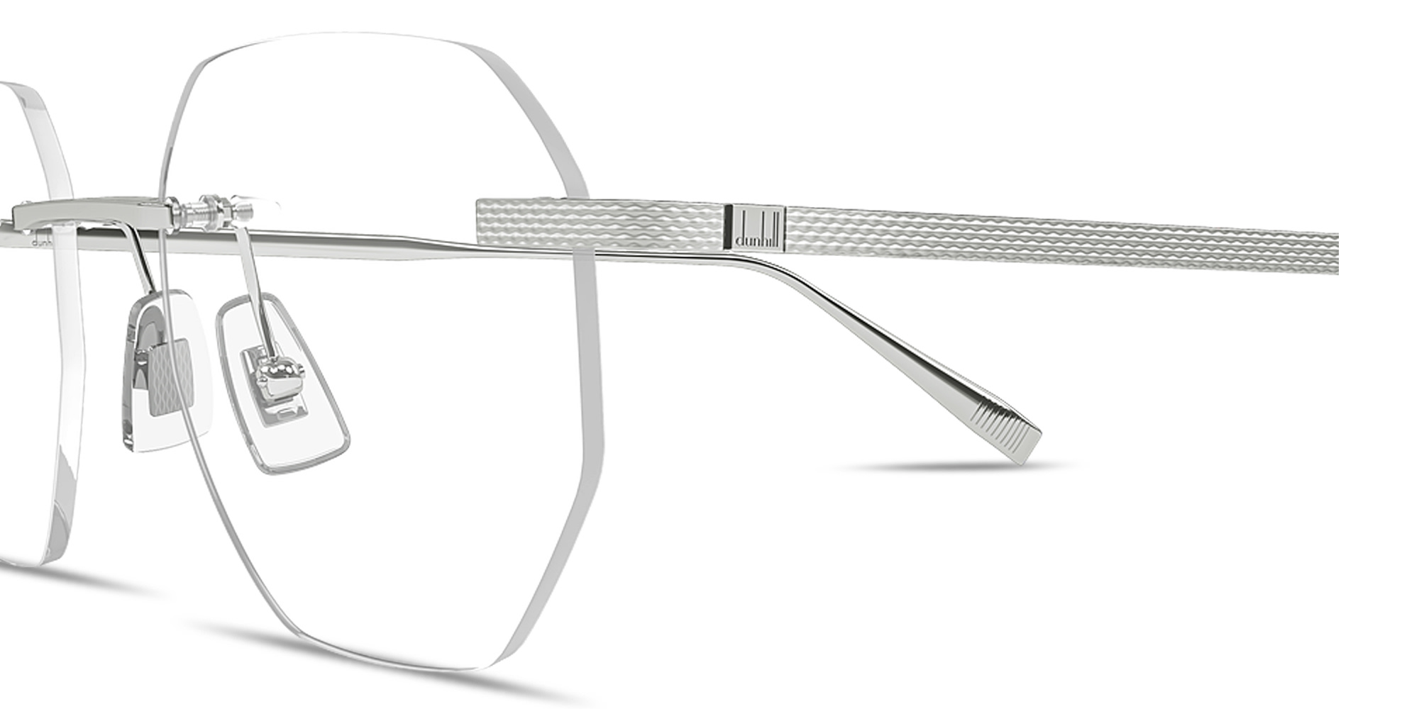 Shop Dunhill Engraved Logo Rimless Irregular Eyeglasses in Silver online.