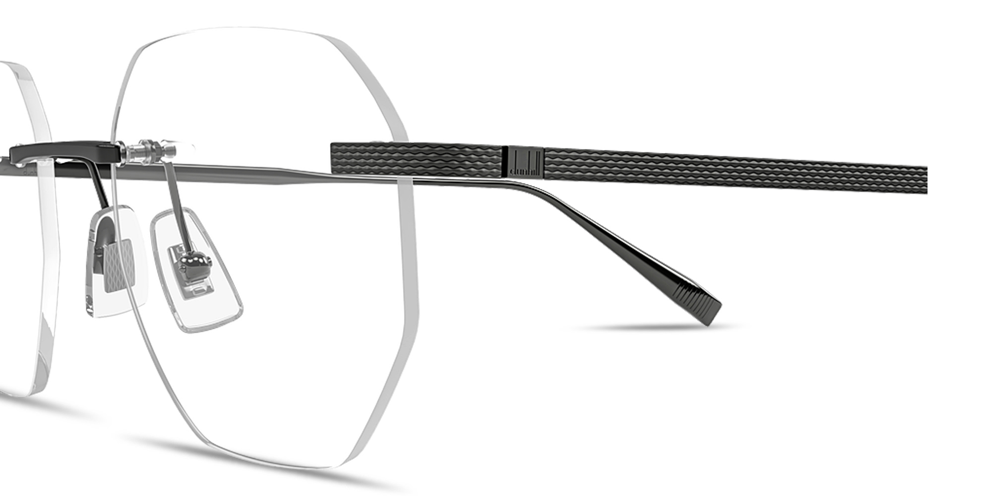 Shop Dunhill Engraved Logo Rimless Irregular Eyeglasses in Ruthenium online.