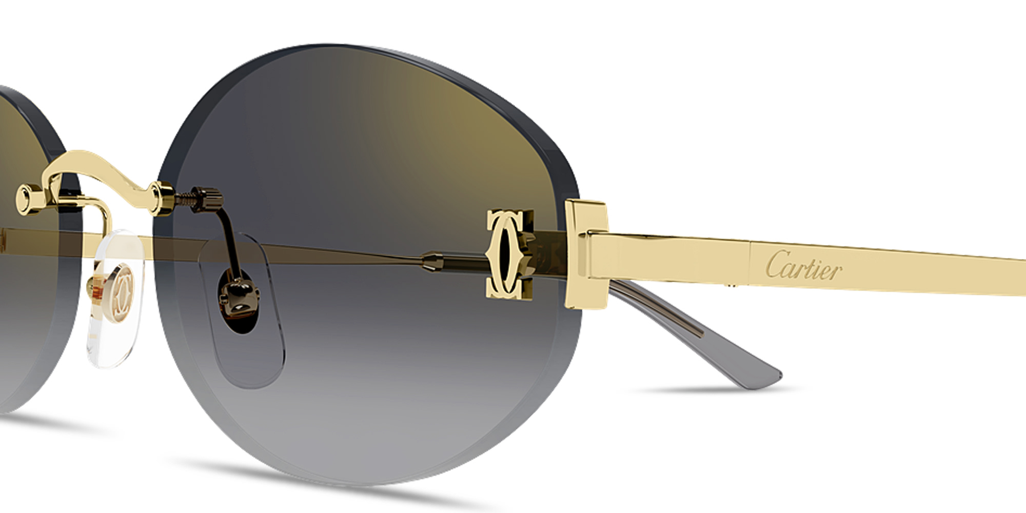 Shop Cartier Double C de Cartier Rimless Oval Sunglasses in Gold online.