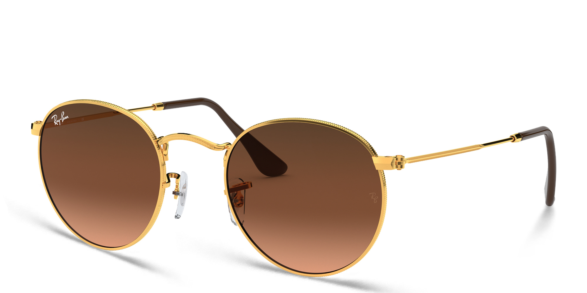 Shop Ray-Ban Unisex Round Metal Sunglasses in Gold online.