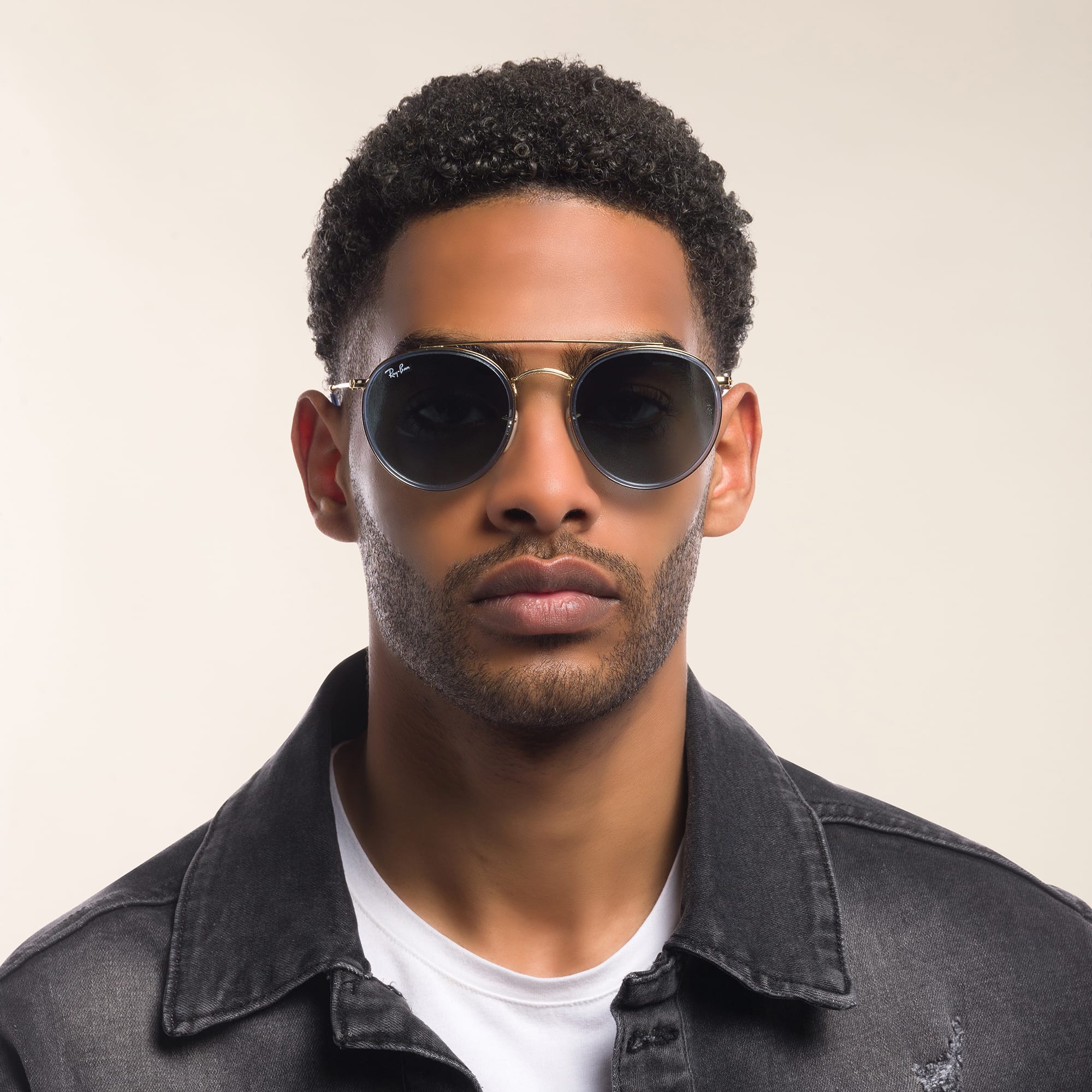 Shop Ray-Ban Round Double Bridge Sunglasses in Gold online.