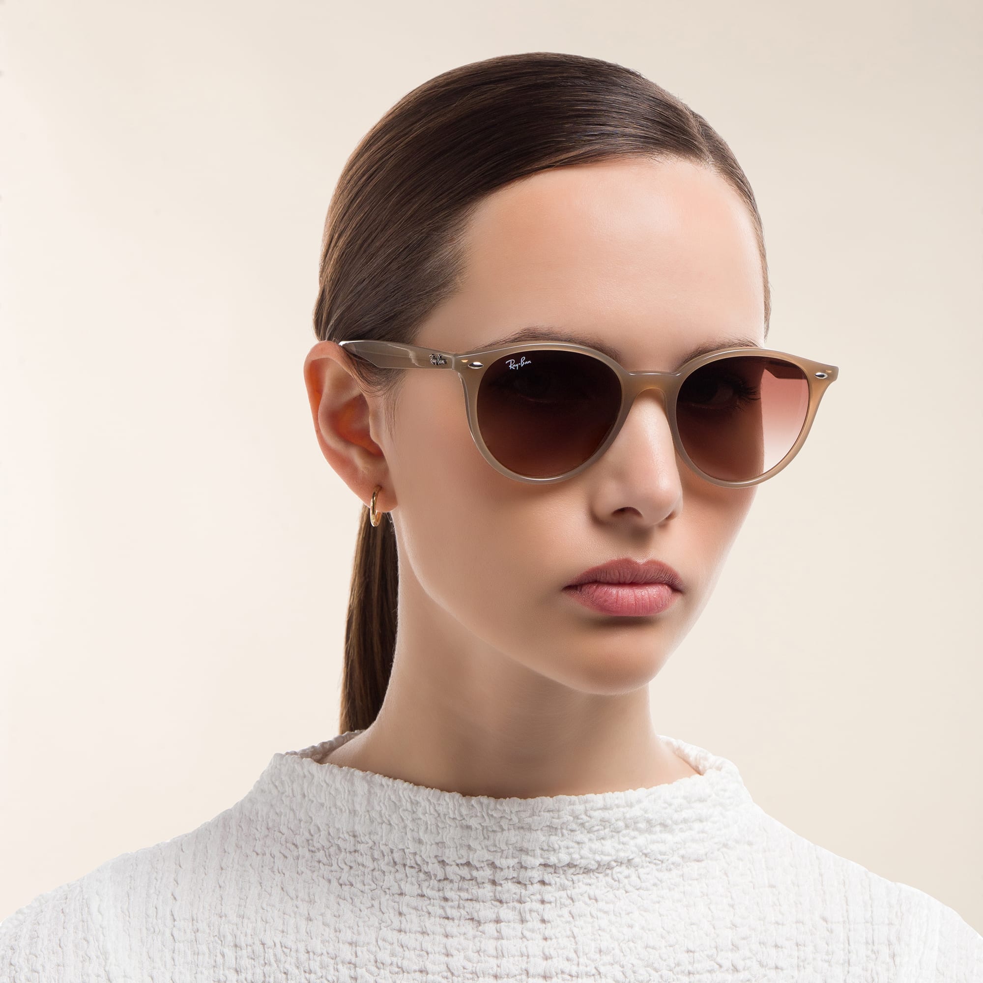 Shop Ray-Ban Unisex Round Sunglasses in Beige online.