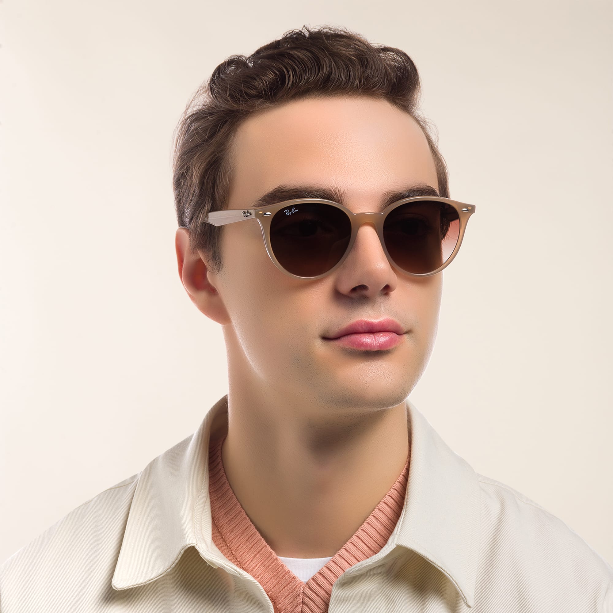 Shop Ray-Ban Unisex Round Sunglasses in Beige online.