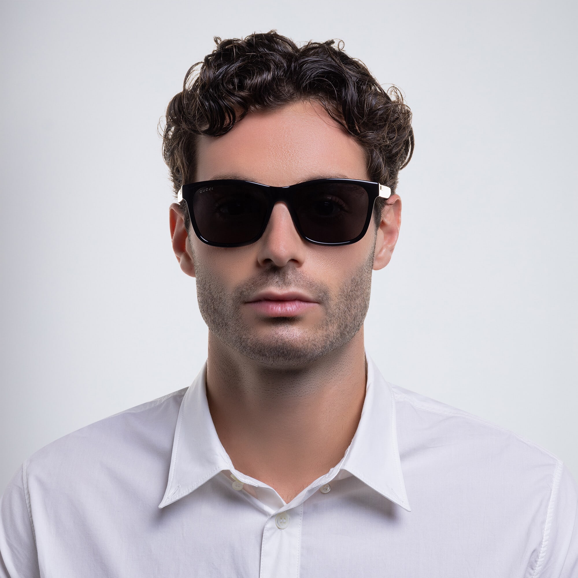 Shop GUCCI Rectangle Sunglasses in Black online.