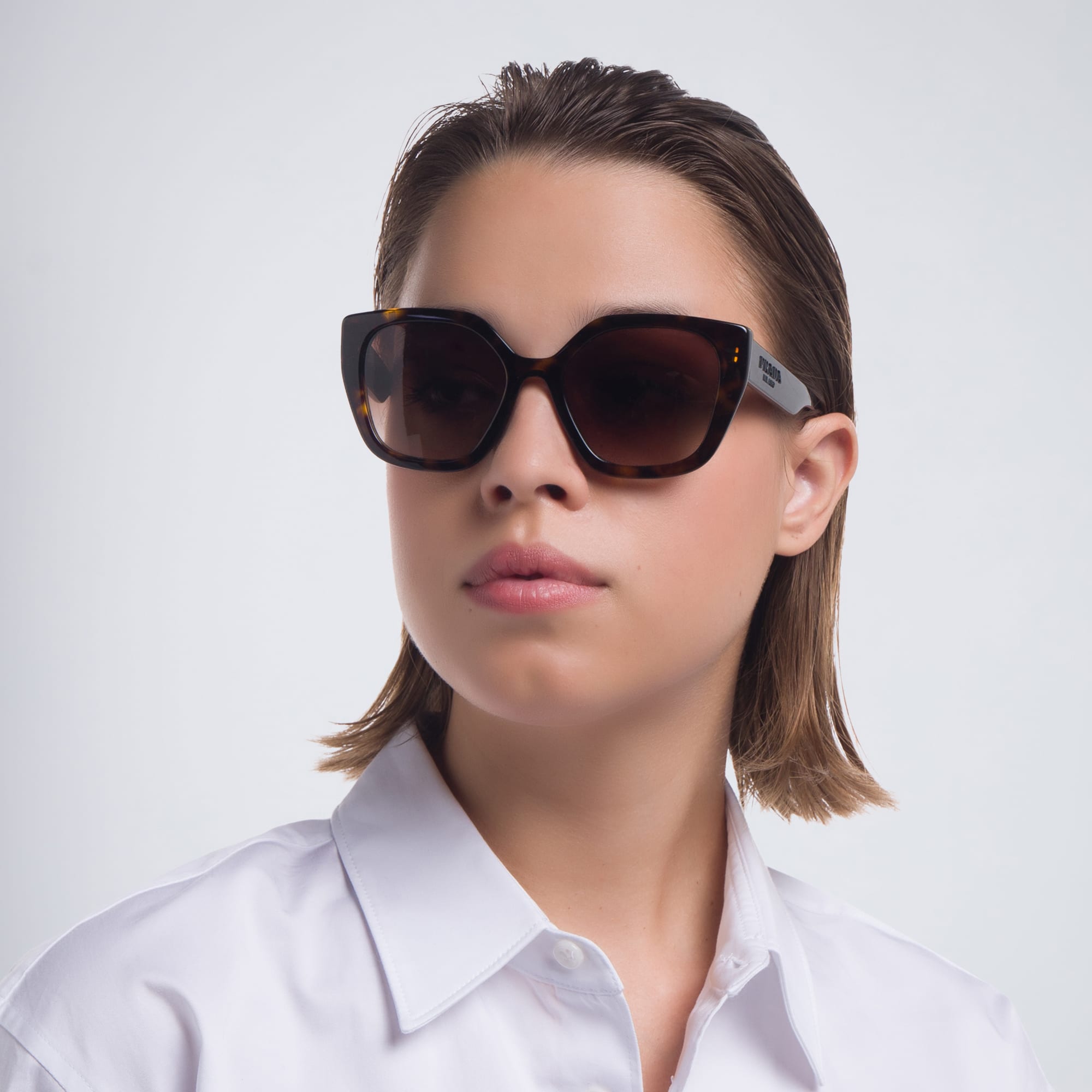 Shop PRADA Cat Eye Sunglasses in Havana online.
