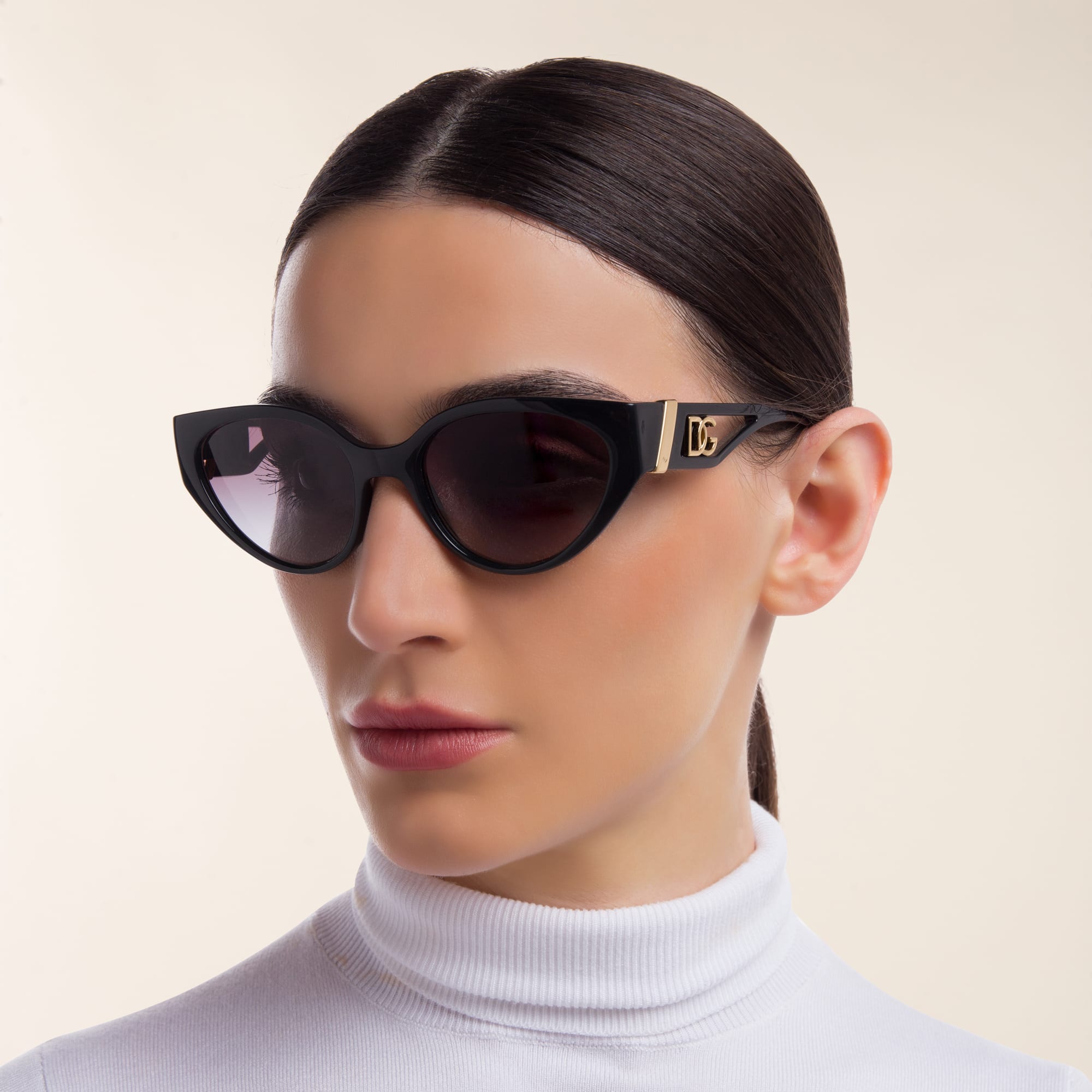 Shop Dolce & Gabbana Cat Eye Sunglasses in Black online.