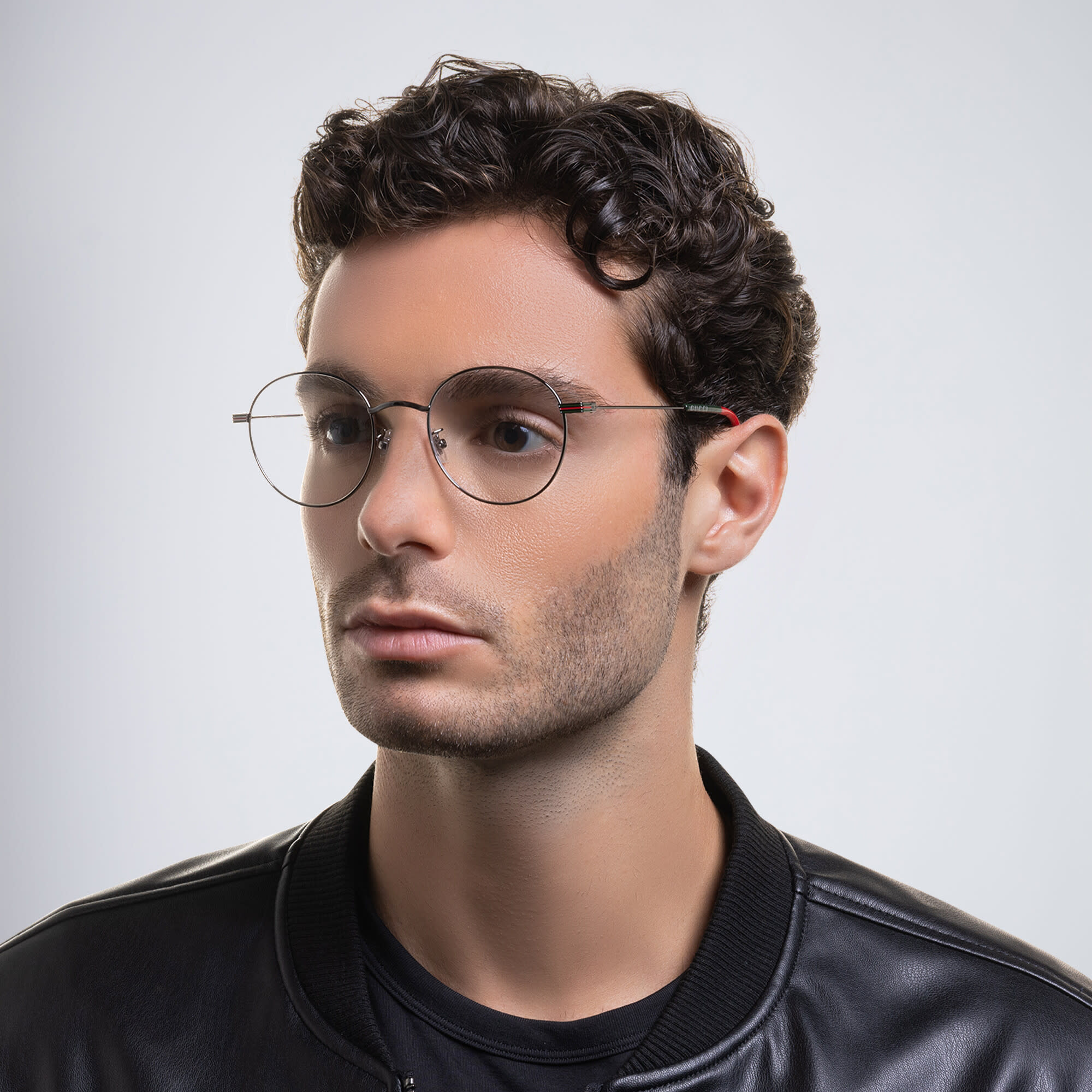 Shop GUCCI Round Eyeglasses in Silver online.