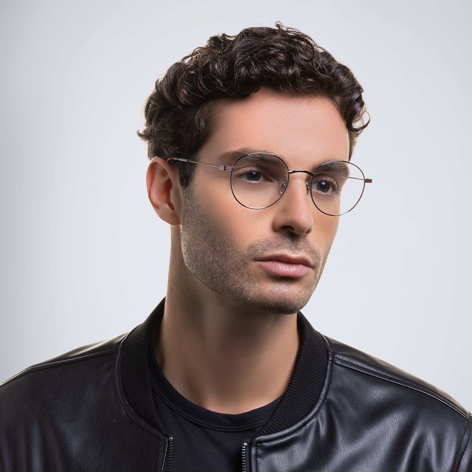 Shop GUCCI Round Eyeglasses in Silver online.