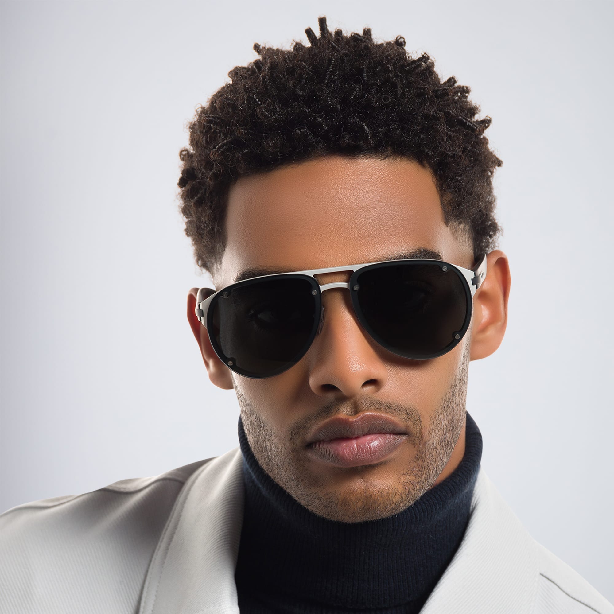 Shop BVLGARI Aviator Sunglasses in Silver online.