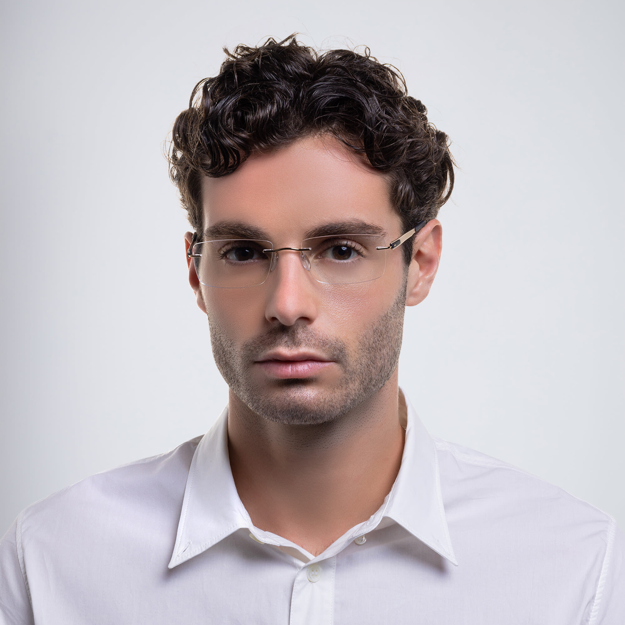 Shop Silhouette Rimless Wide Rectangle Eyeglasses in Gold online.