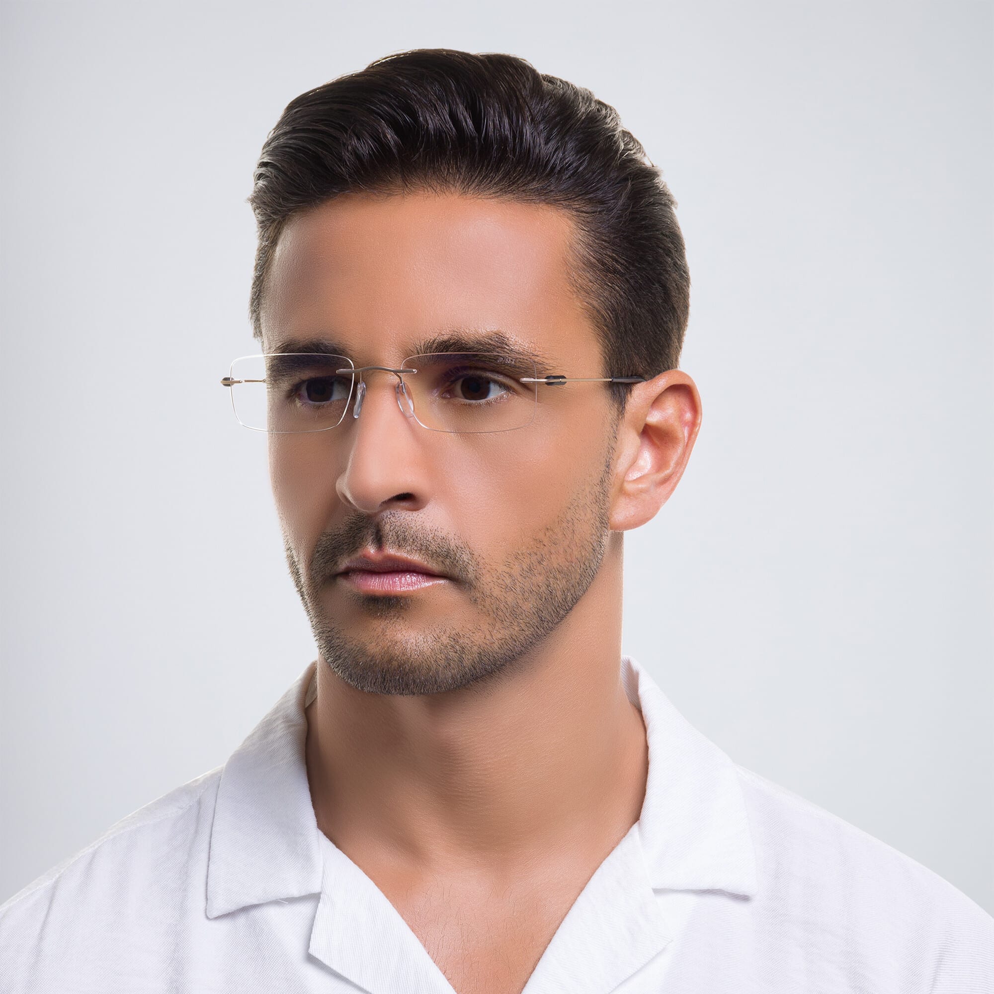 Shop Silhouette Rimless Rectangle Eyeglasses in Gold online.