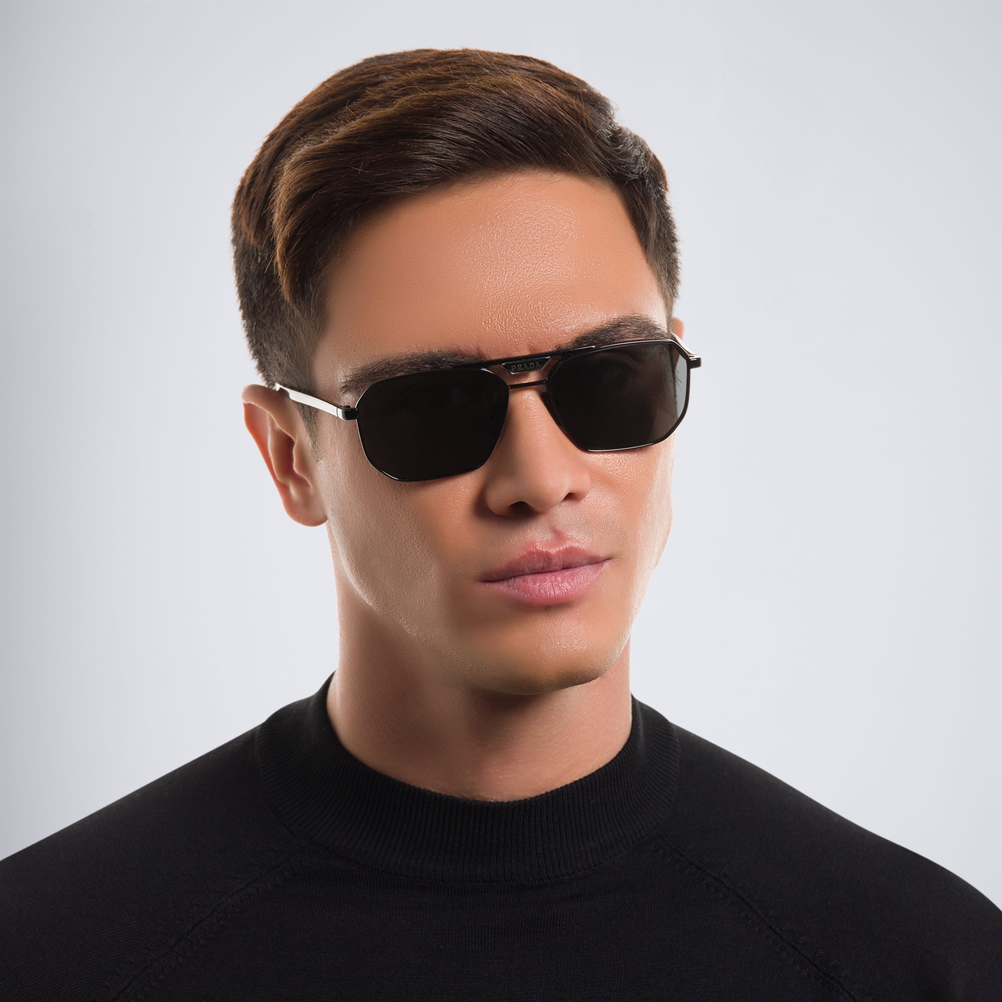Shop PRADA Rectangle Sunglasses in Black online.