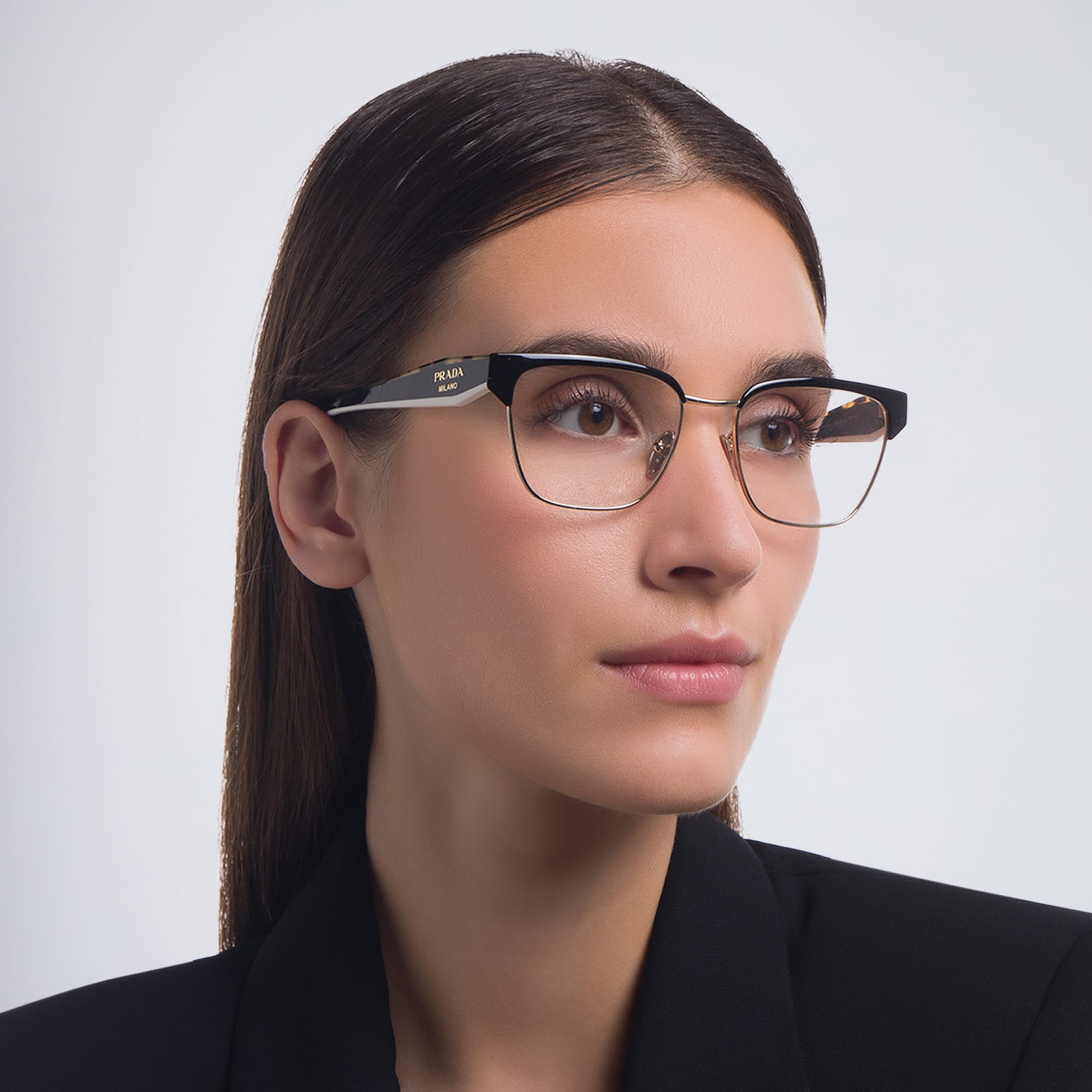 Shop PRADA Irregular Eyeglasses in Black/Pale Gold online.
