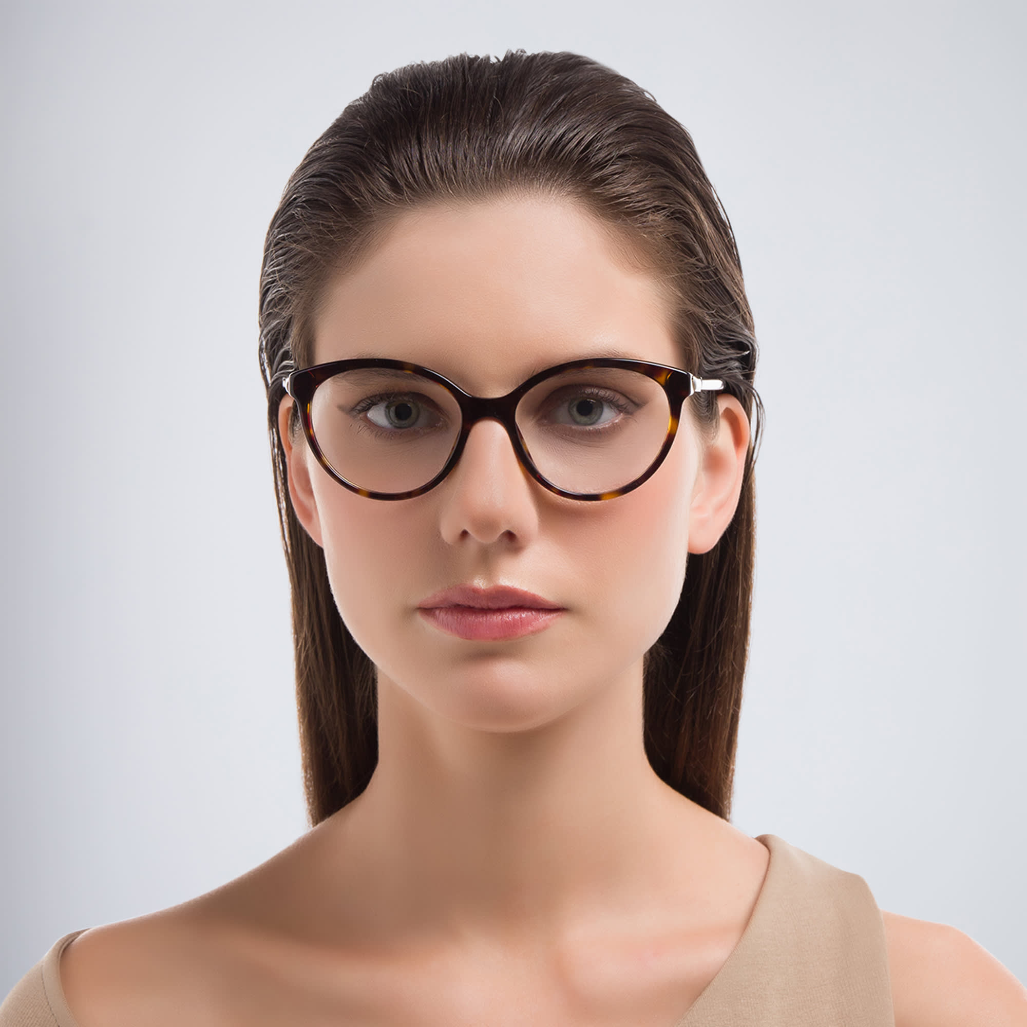 Shop PRADA Round Eyeglasses in Tortoise online.