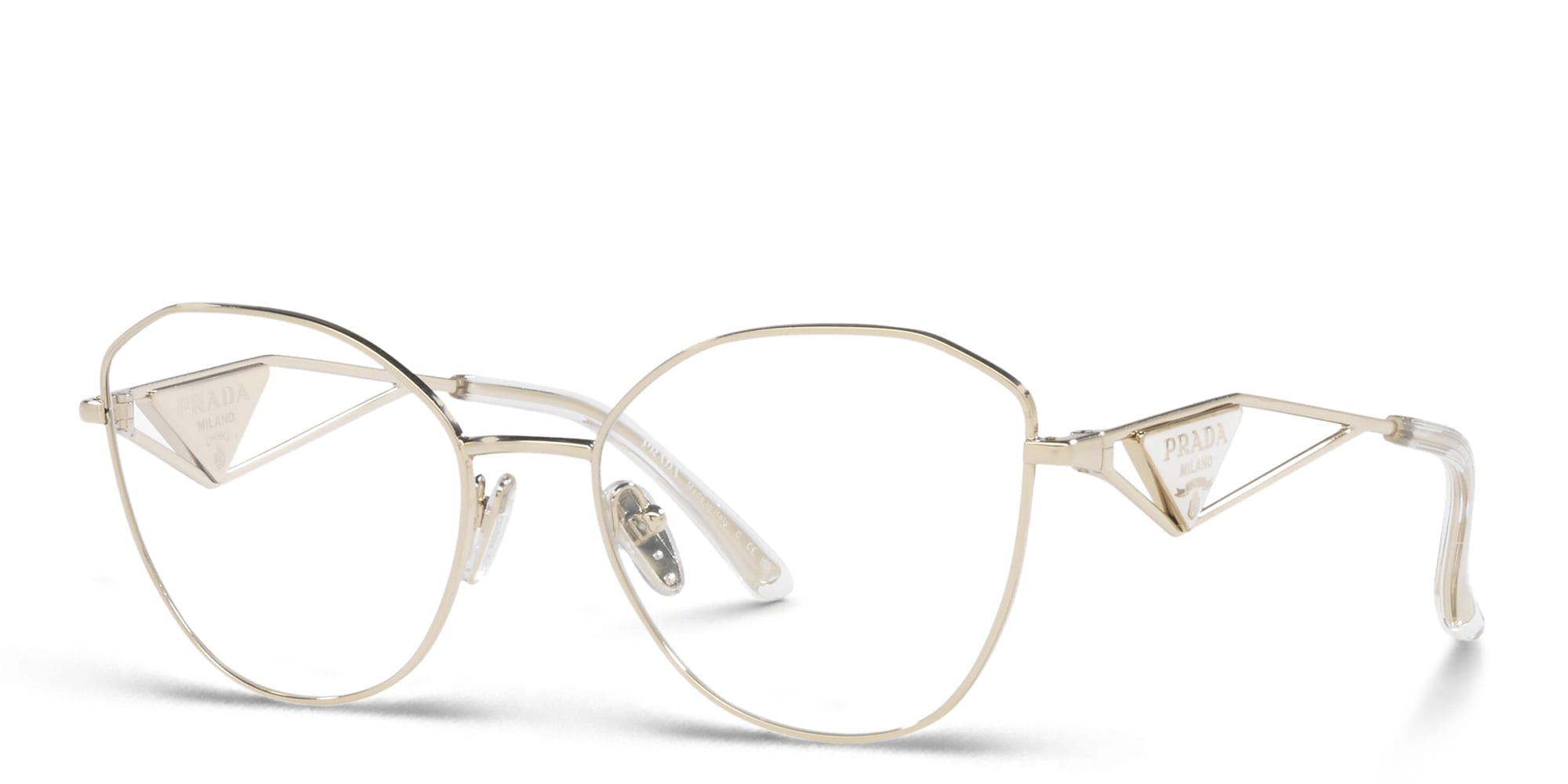 Shop PRADA Irregular Eyeglasses in Pale Gold online.