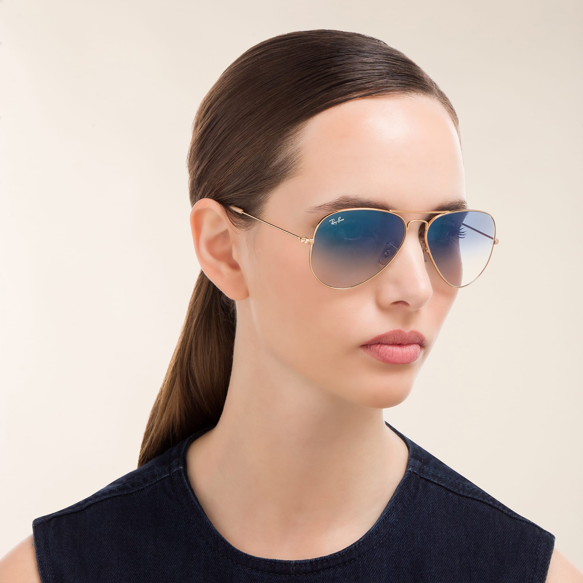 Shop Ray-Ban Aviator Gradient Sunglasses in Gold online.