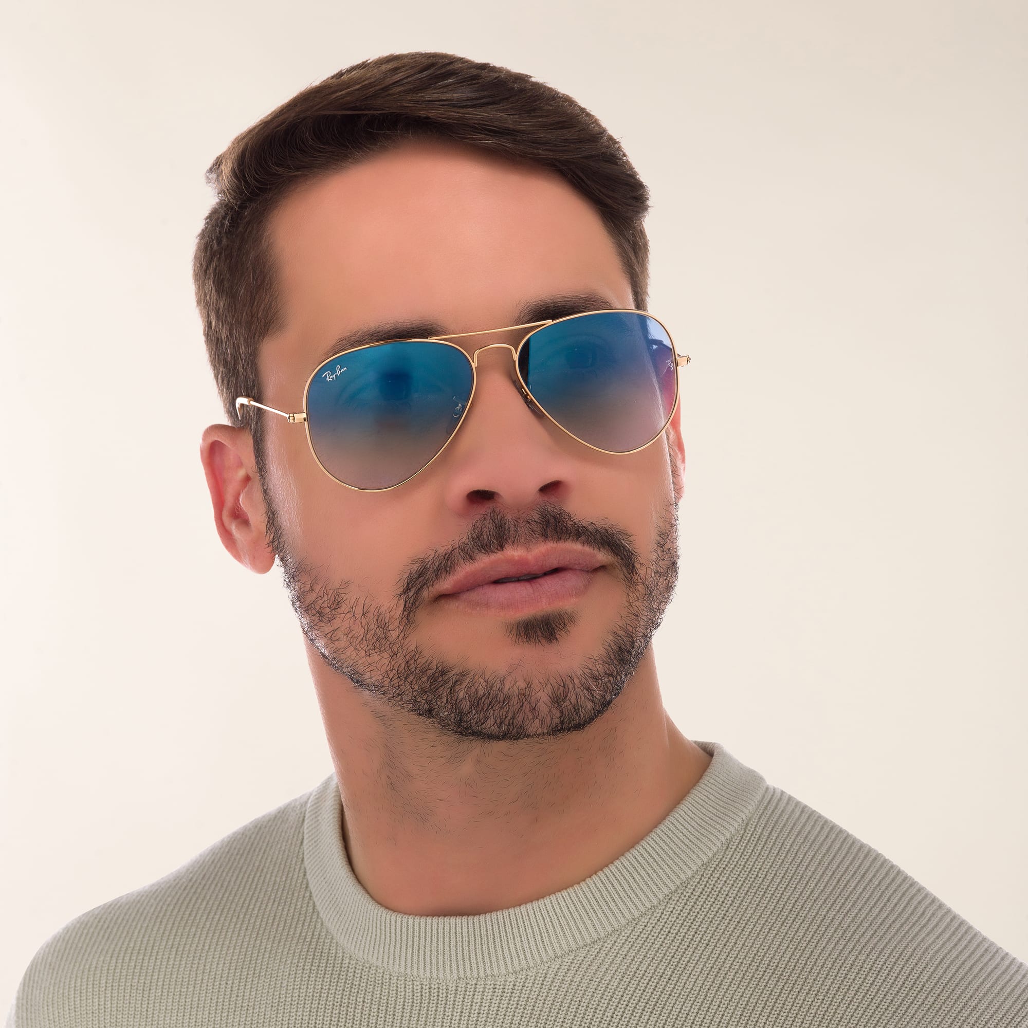 Shop Ray-Ban Aviator Gradient Sunglasses in Gold online.
