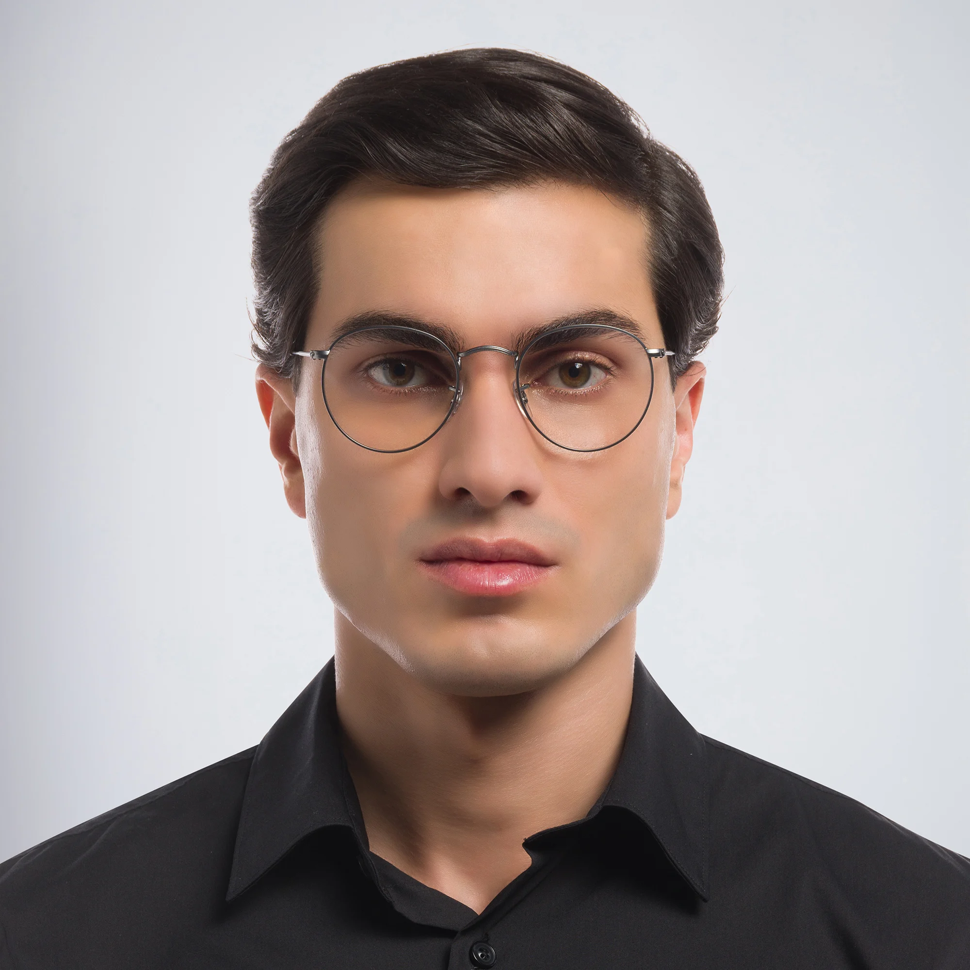 Shop Ray-Ban Round Metal Optics Eyeglasses in Ruthenium online.