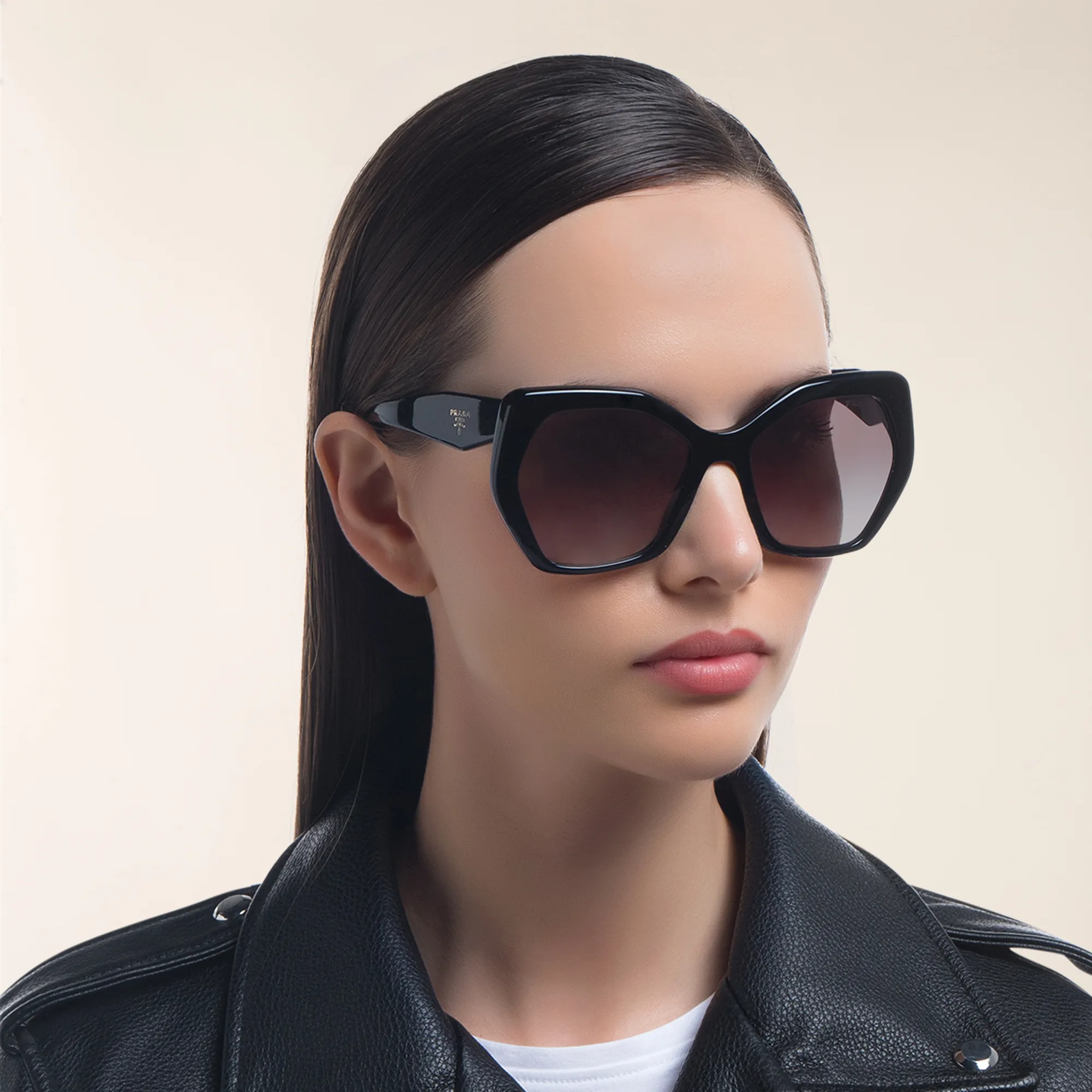 Shop PRADA Irregular Sunglasses in Black online.