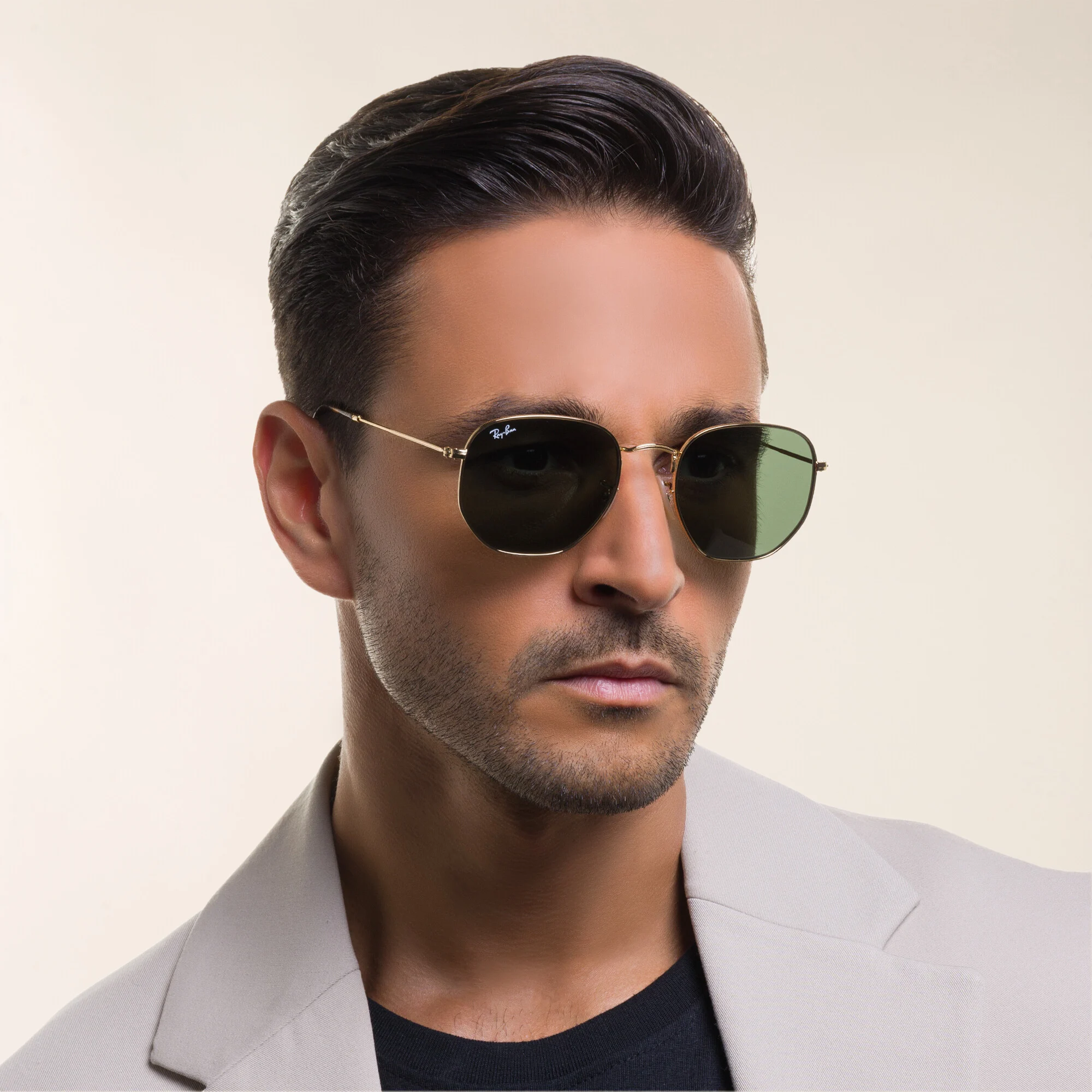 Shop Ray-Ban Hexagonal Unisex Sunglasses in Gold online.