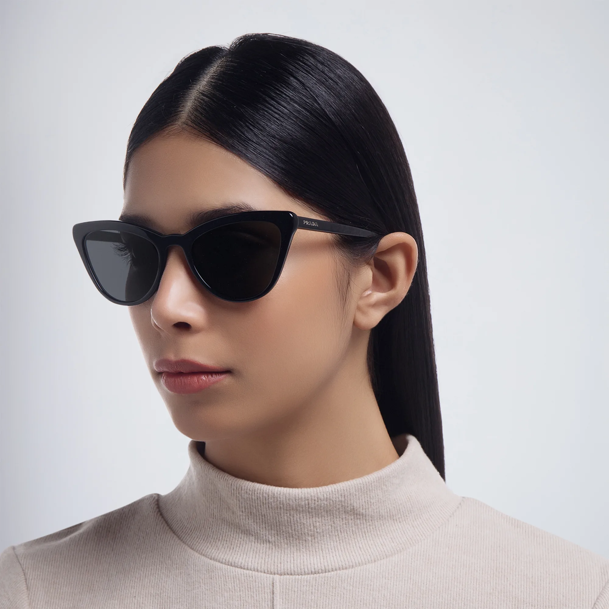 Shop PRADA Cat Eye Sunglasses in Shiny Black online.
