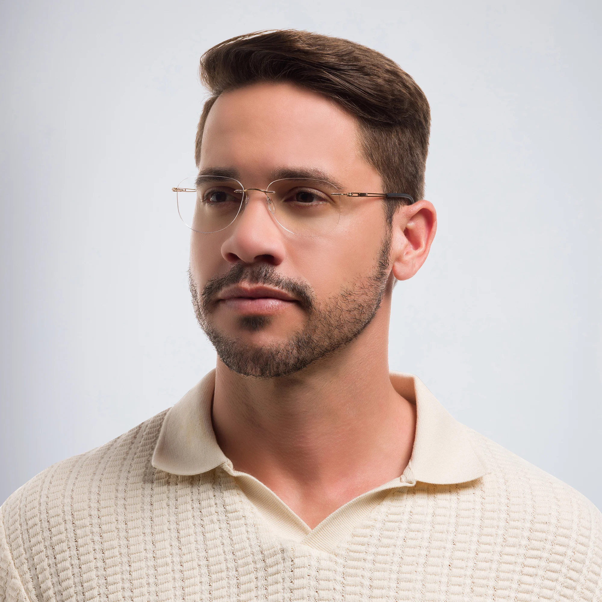 Shop Silhouette Rimless Aviator Eyeglasses in Gold online.