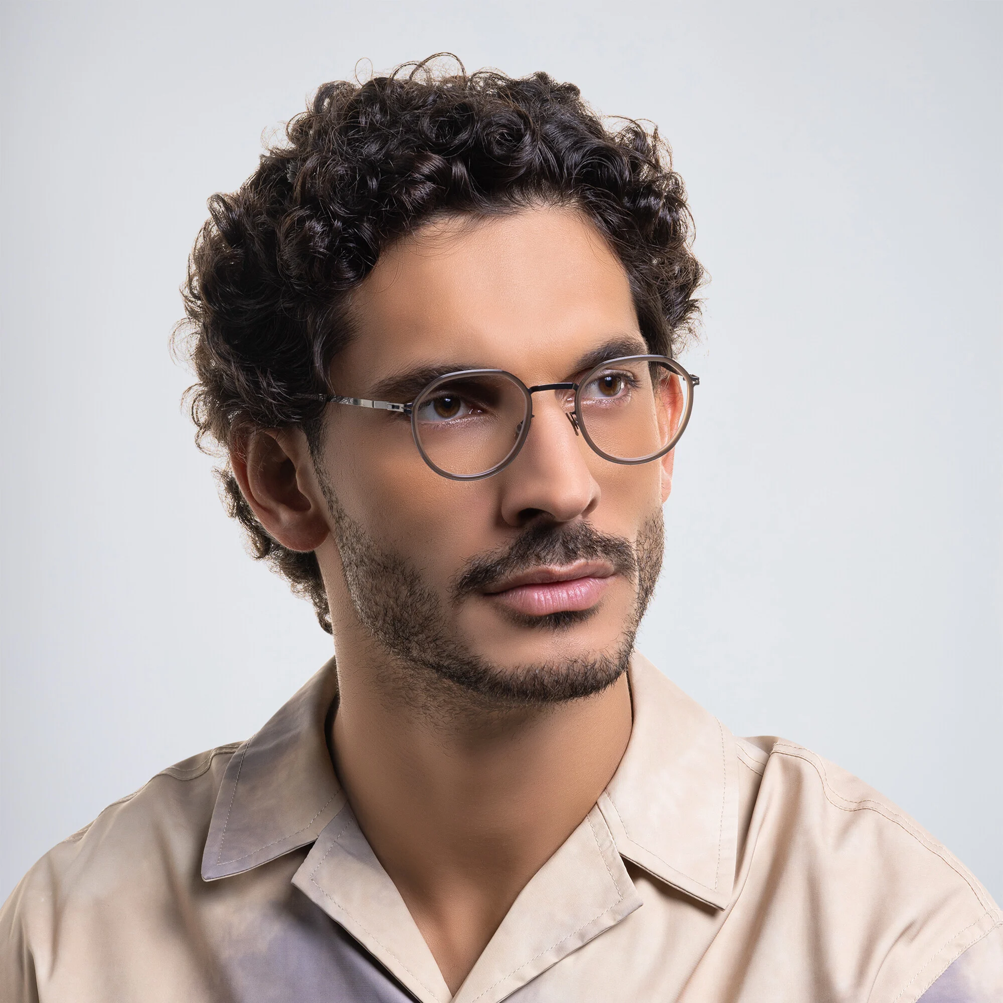 Shop MYKITA Justus Unisex Round Eyeglasses in Brown online.