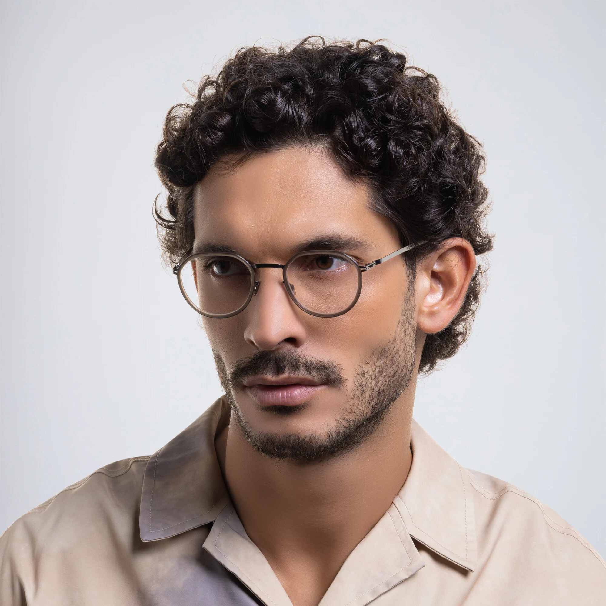 Shop MYKITA Justus Unisex Round Eyeglasses in Brown online.