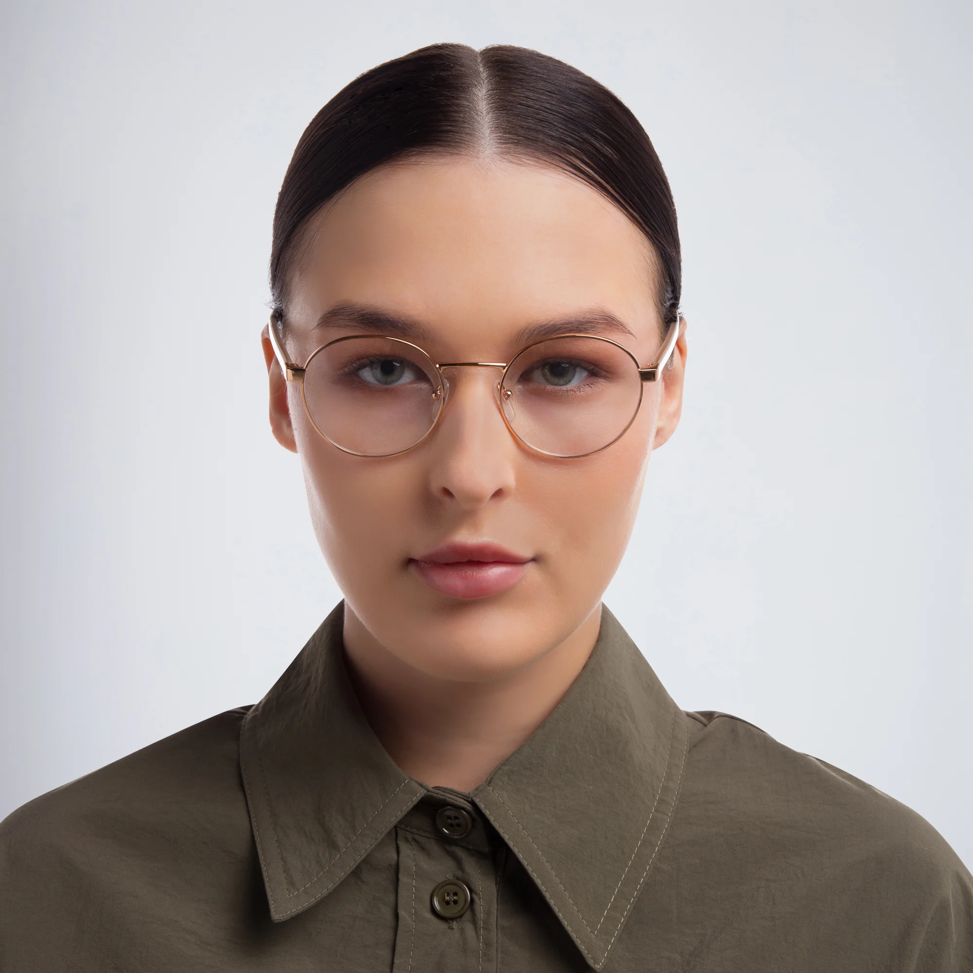 Shop PRADA Round Eyeglasses in Pink online.