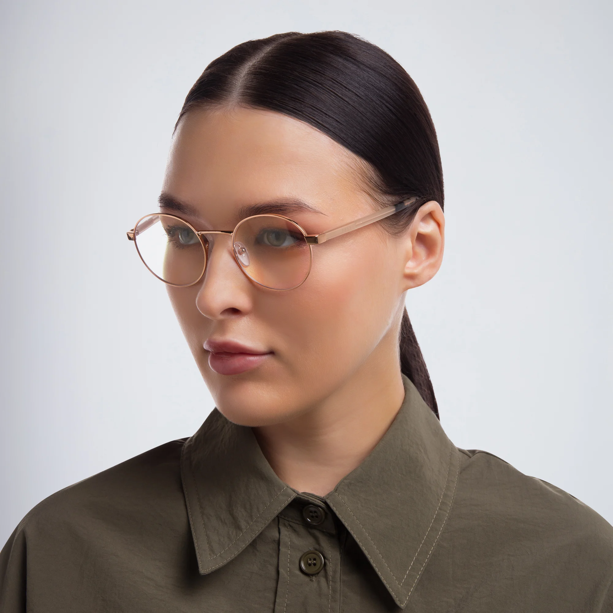 Shop PRADA Round Eyeglasses in Pink online.