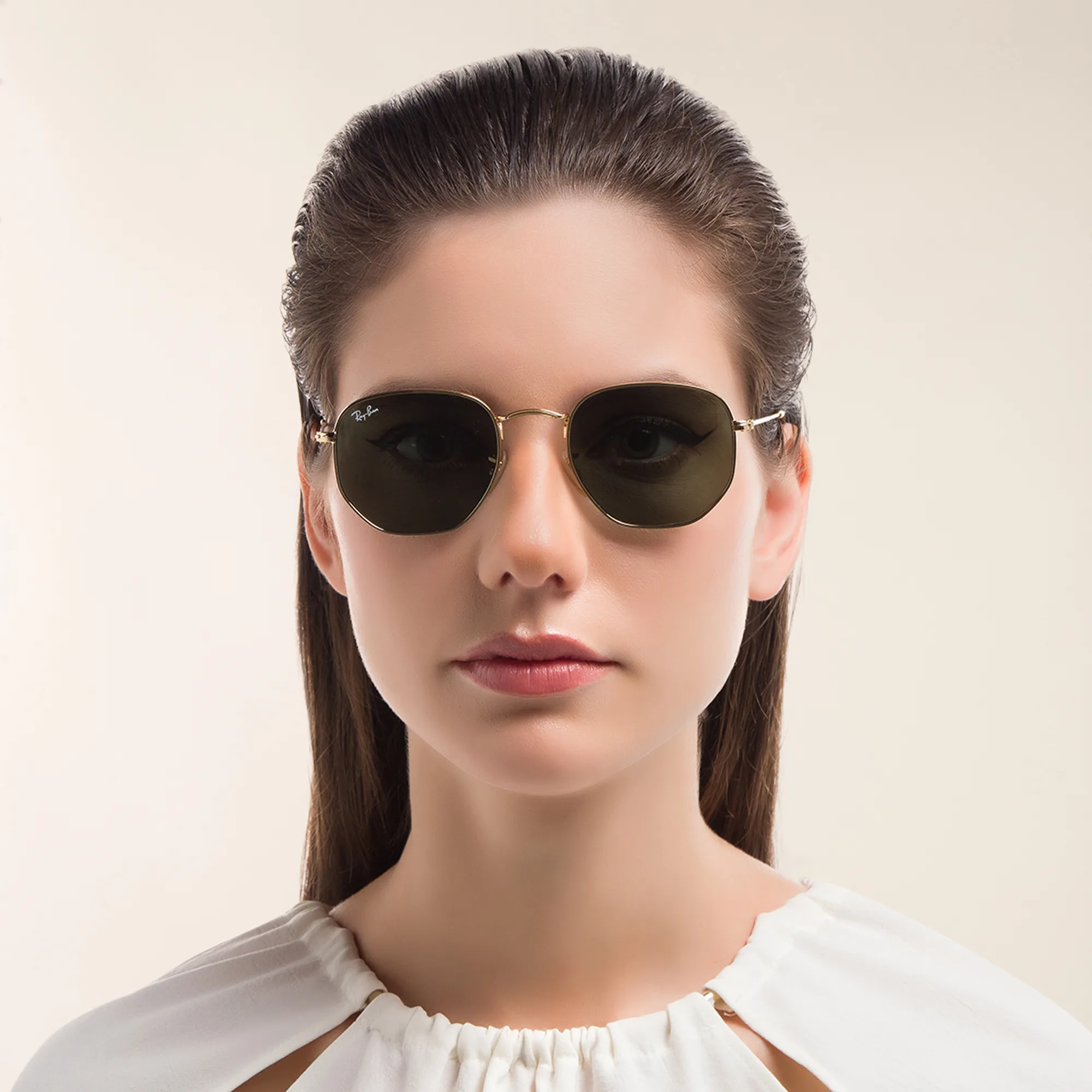 Shop Ray-Ban Hexagonal Unisex Sunglasses in Gold online.