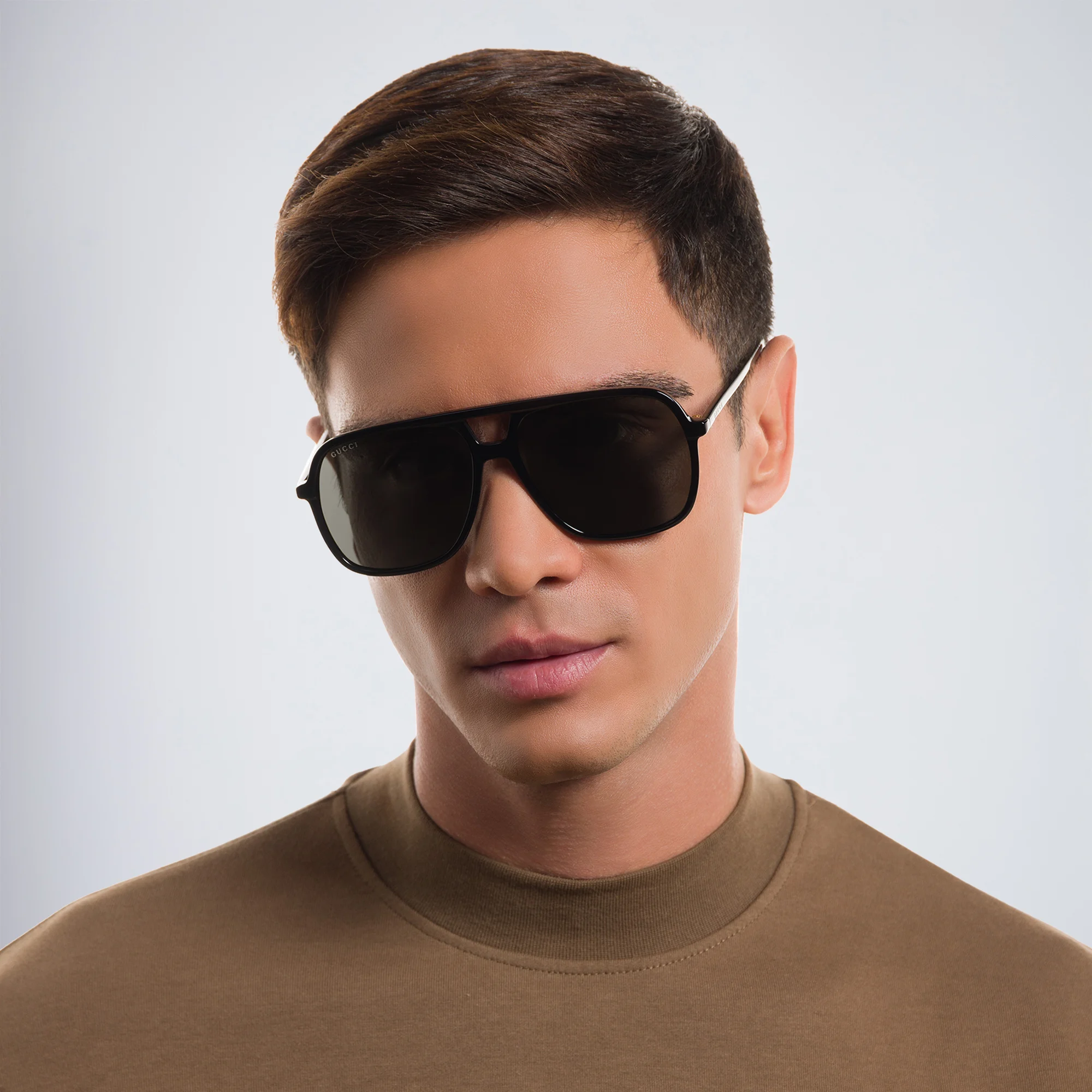 Shop GUCCI Aviator Sunglasses in Black online.
