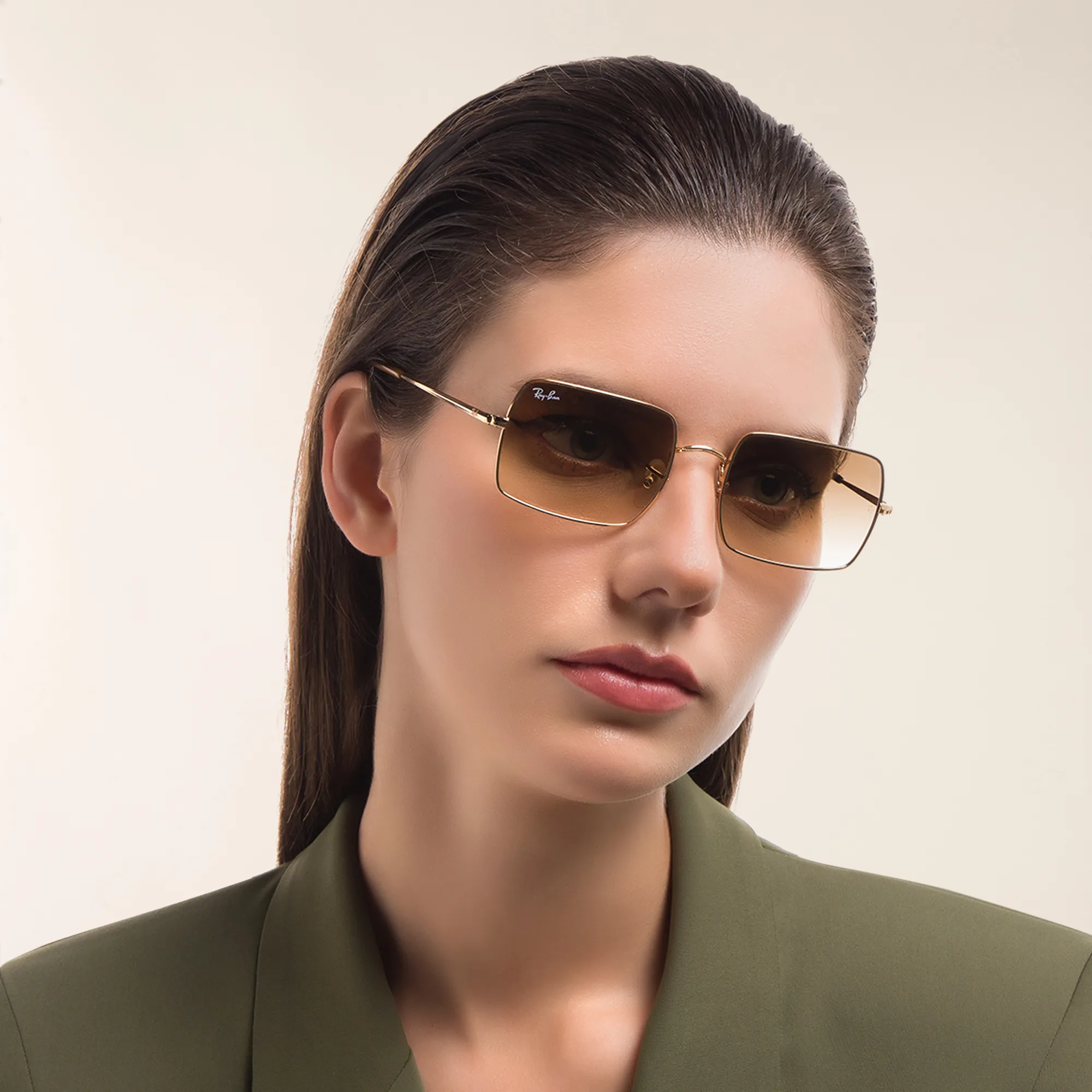 Shop Ray-Ban Unisex Rectangle Sunglasses in Gold online.