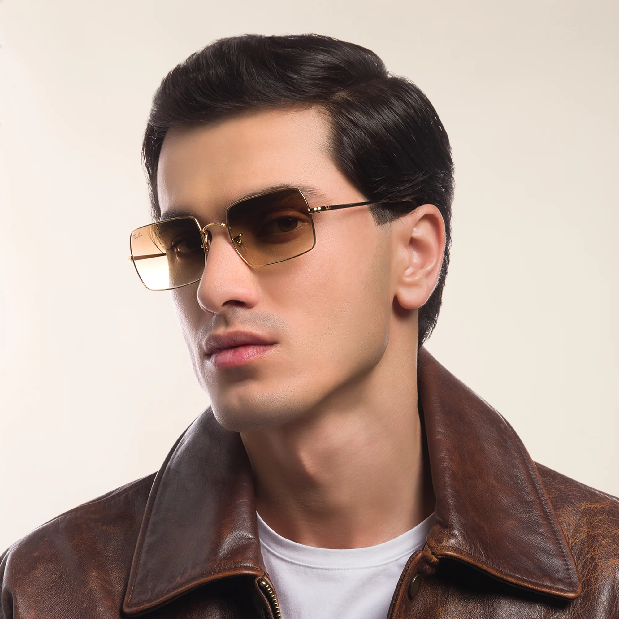 Shop Ray-Ban Unisex Rectangle Sunglasses in Gold online.