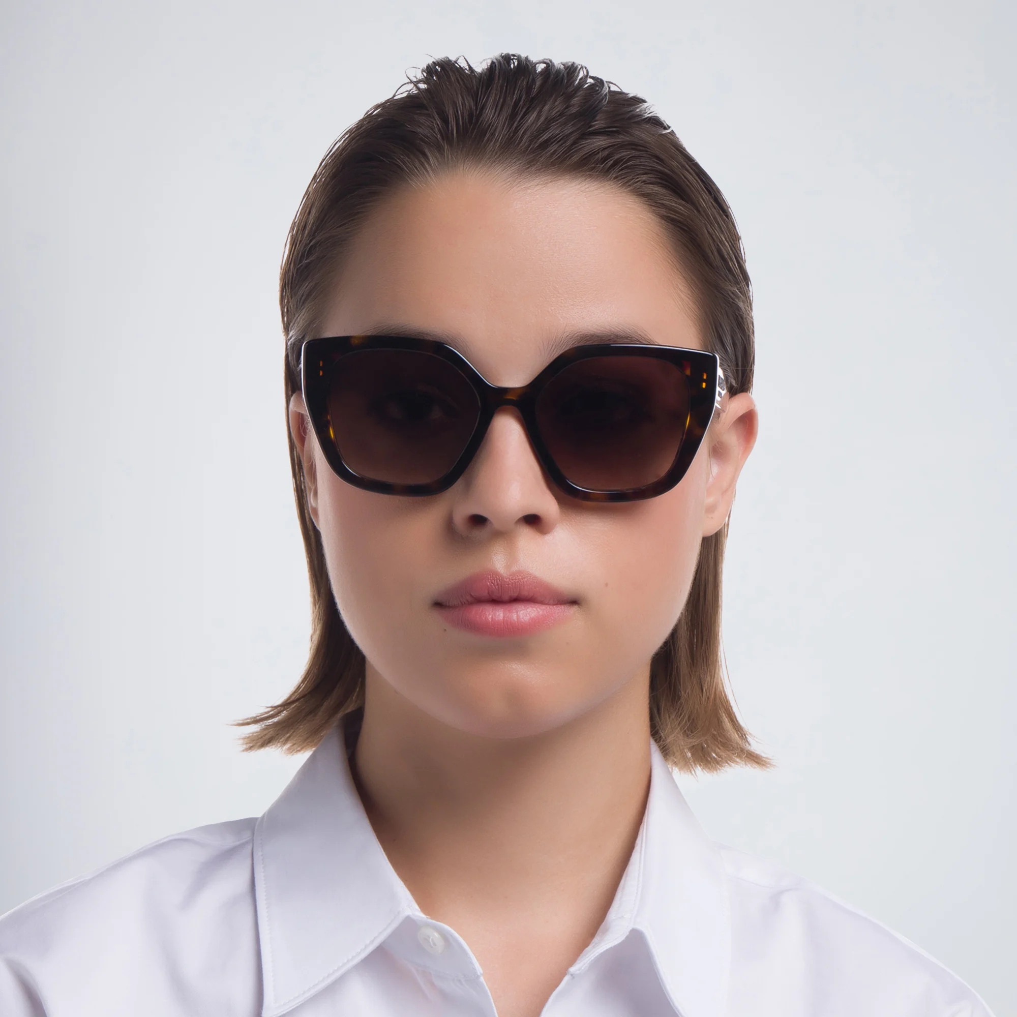 Shop PRADA Cat Eye Sunglasses in Havana online.