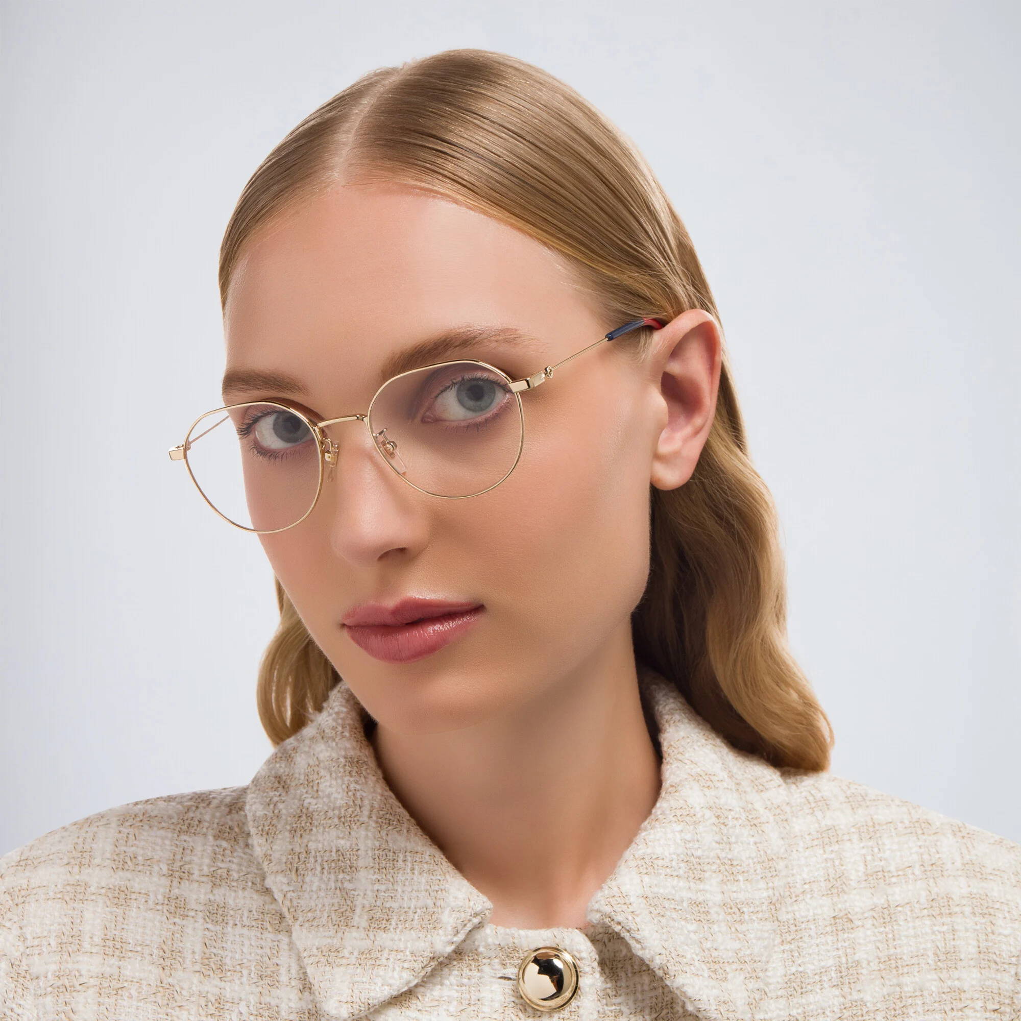 Shop GUCCI Round Eyeglasses in Gold online.