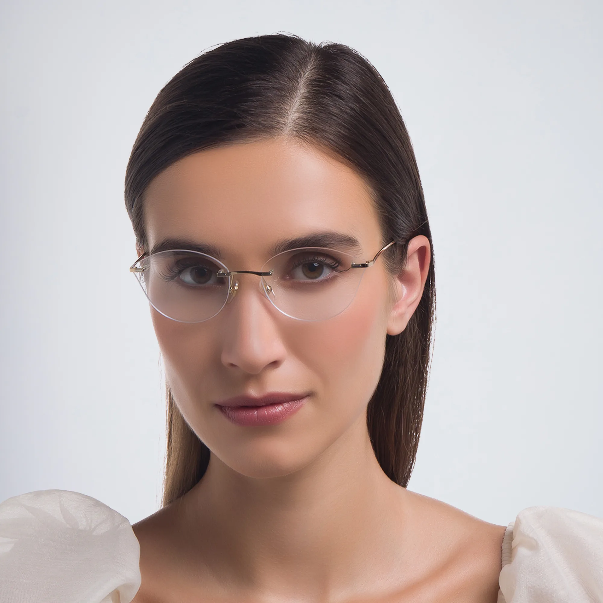 Shop EYE'M Rimless Wide Cat Eye Eyeglasses in Antique Gold online.