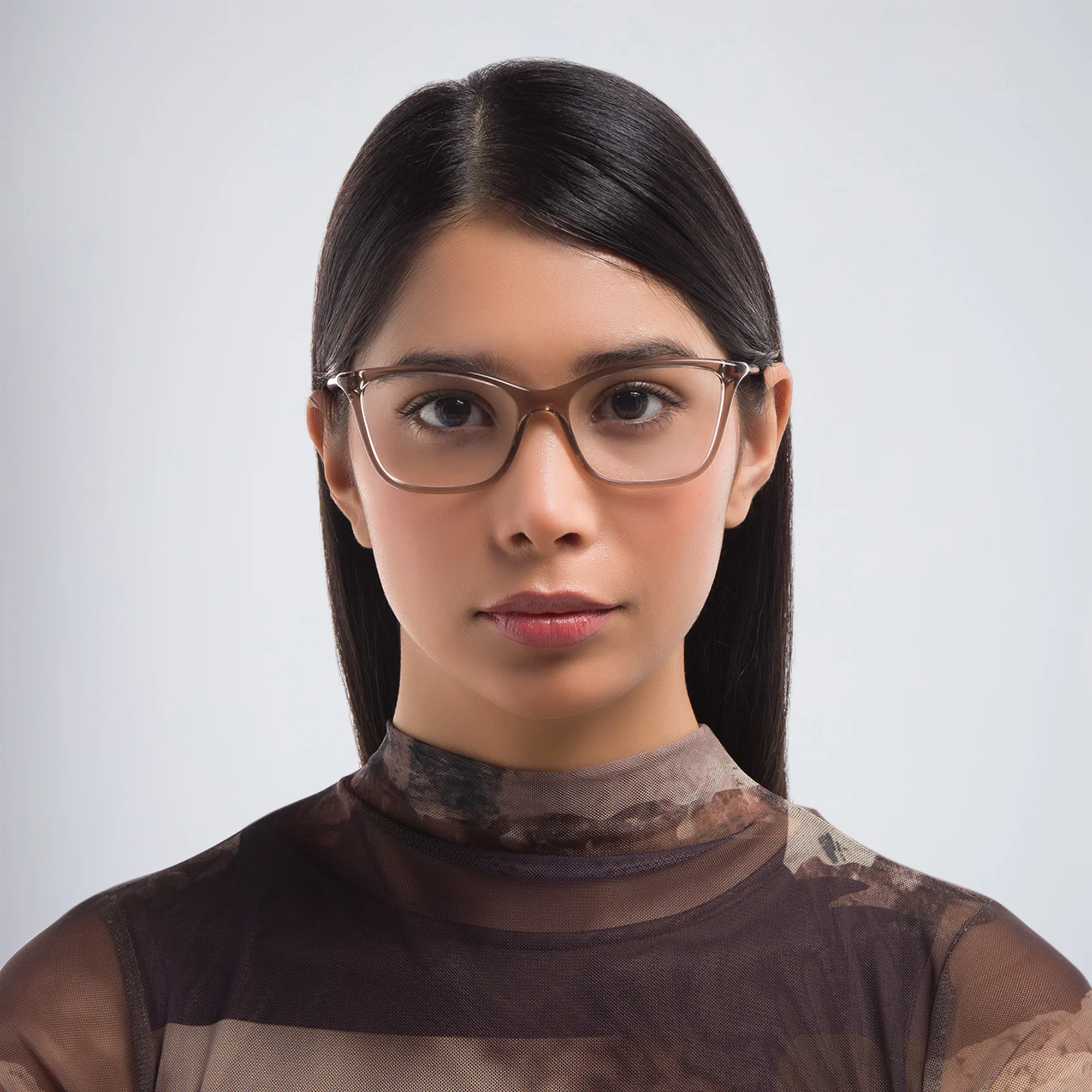 Shop PRADA Cat Eye Eyeglasses in Honey Crystal online.