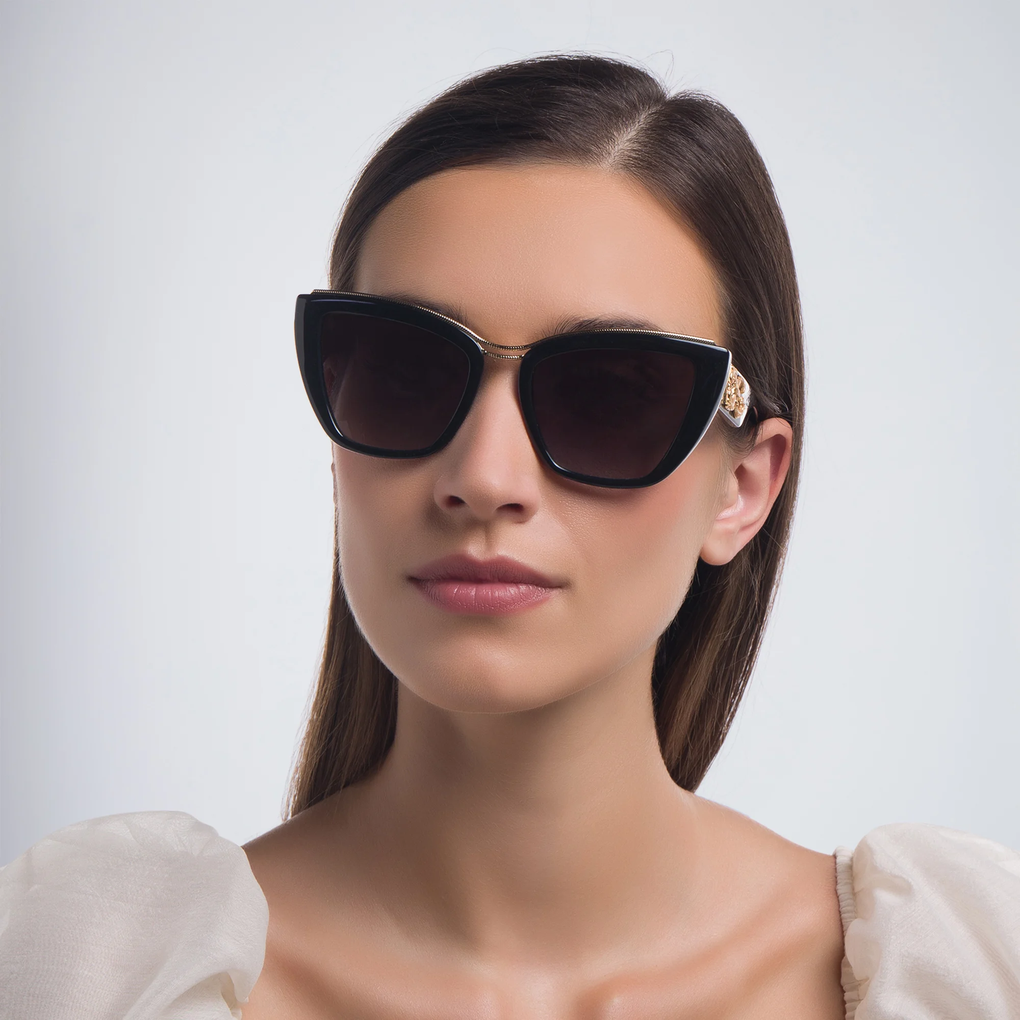 Shop Dolce & Gabbana Cat Eye Sunglasses in Black online.