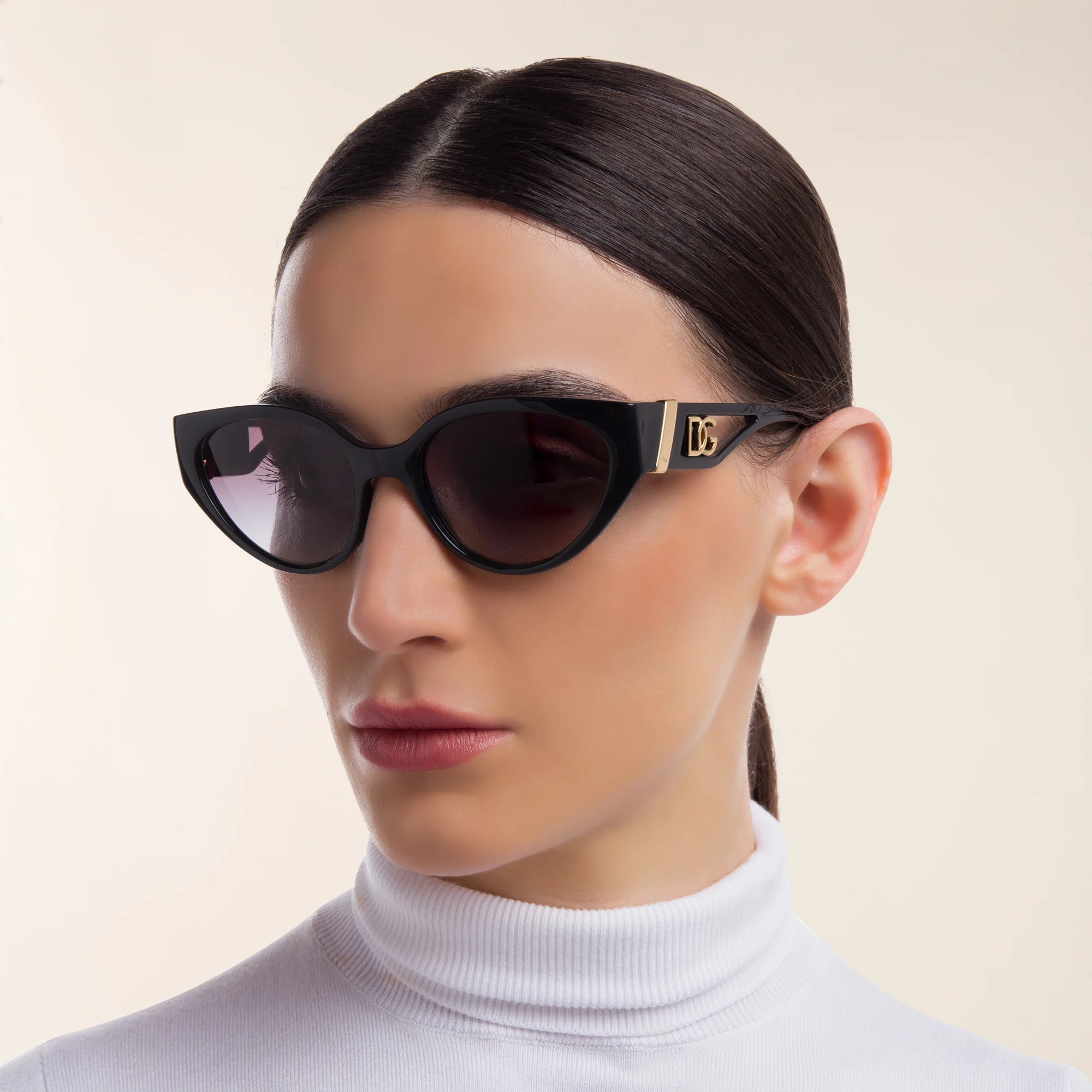 Shop Dolce & Gabbana Cat Eye Sunglasses in Black online.