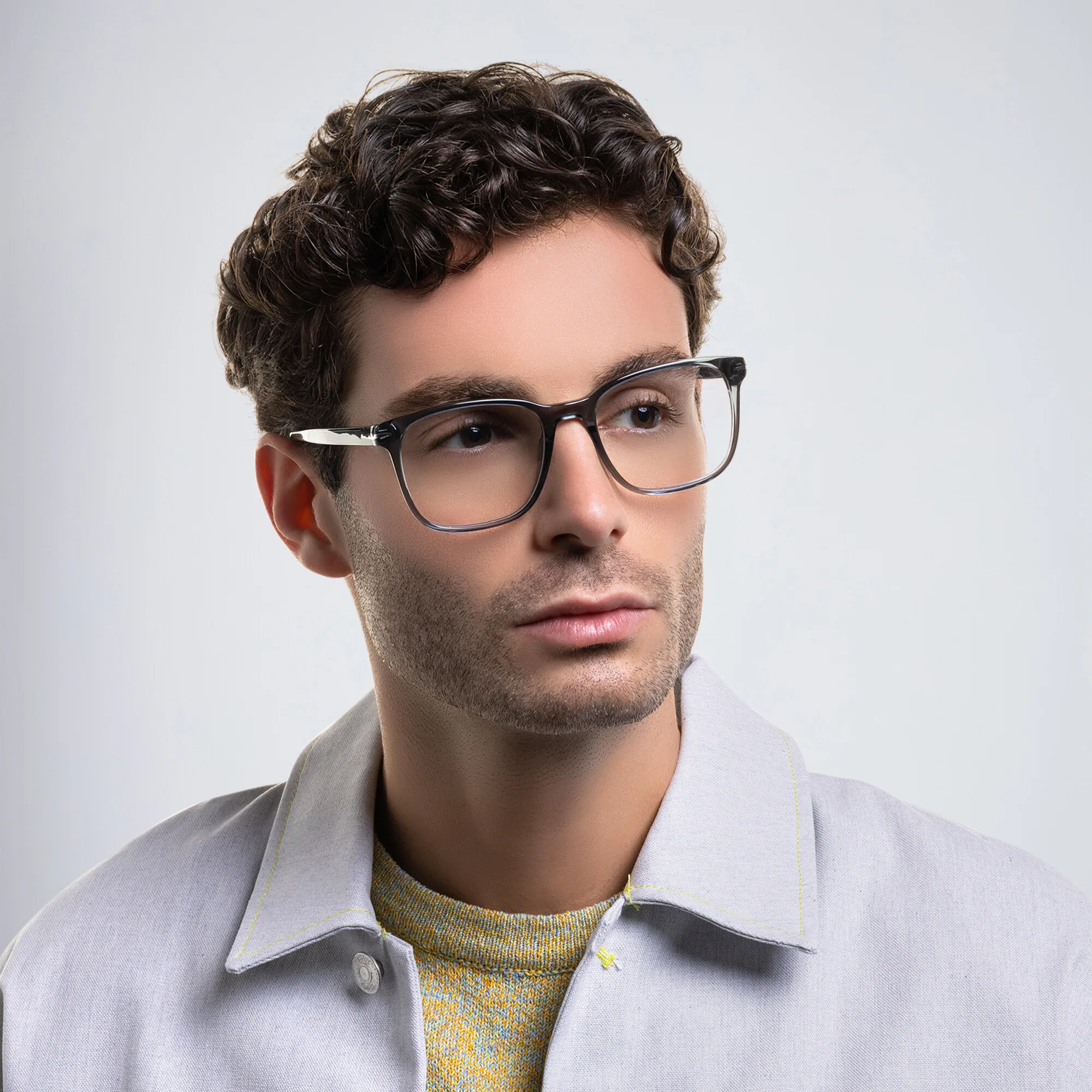 Shop DAVID BECKHAM Wide Rectangle Eyeglasses in Transparent Grey online.