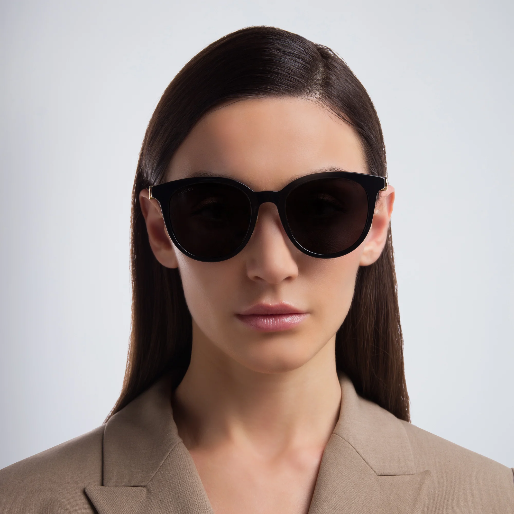 Shop GUCCI Cat Eye Sunglasses in Black online.