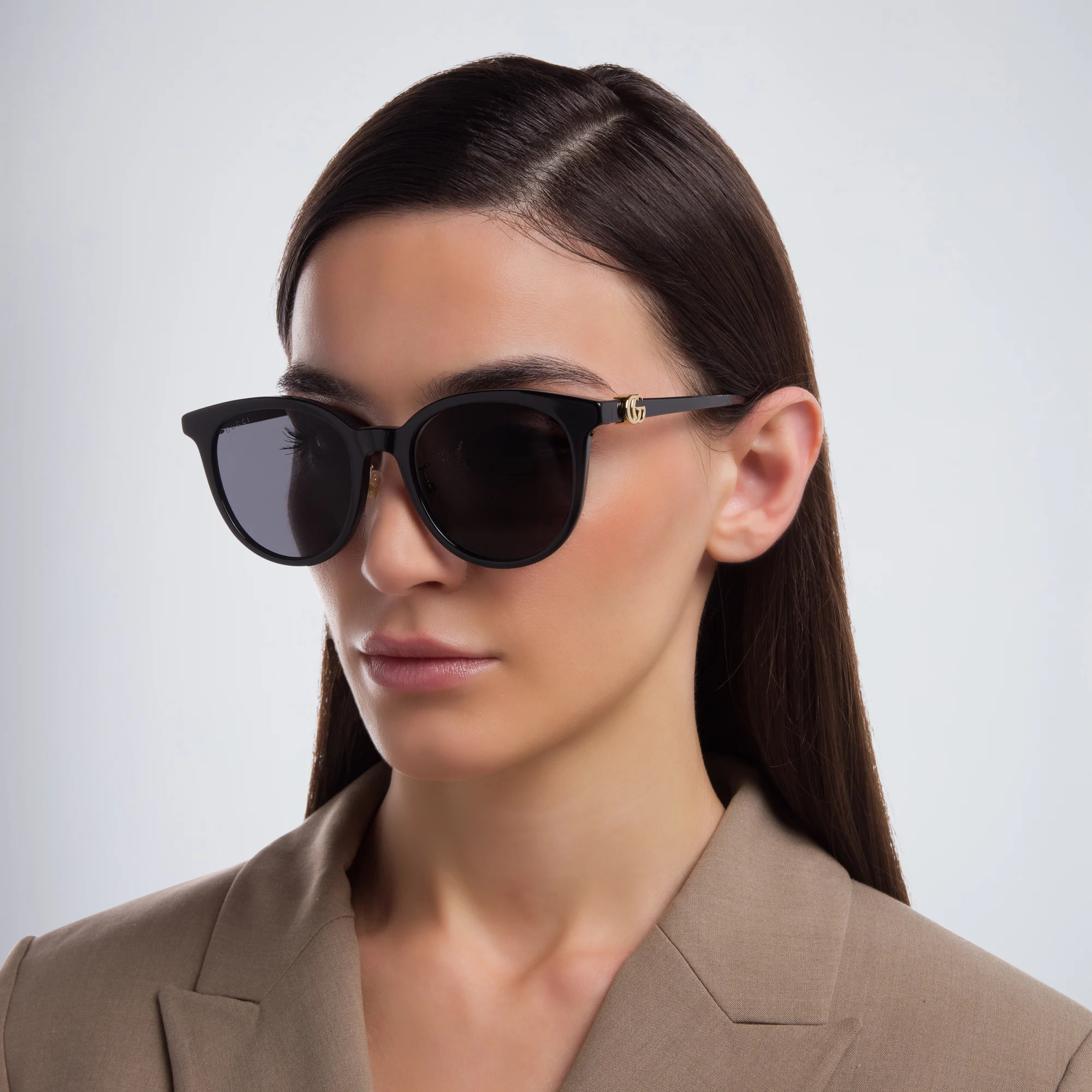 Shop GUCCI Cat Eye Sunglasses in Black online.